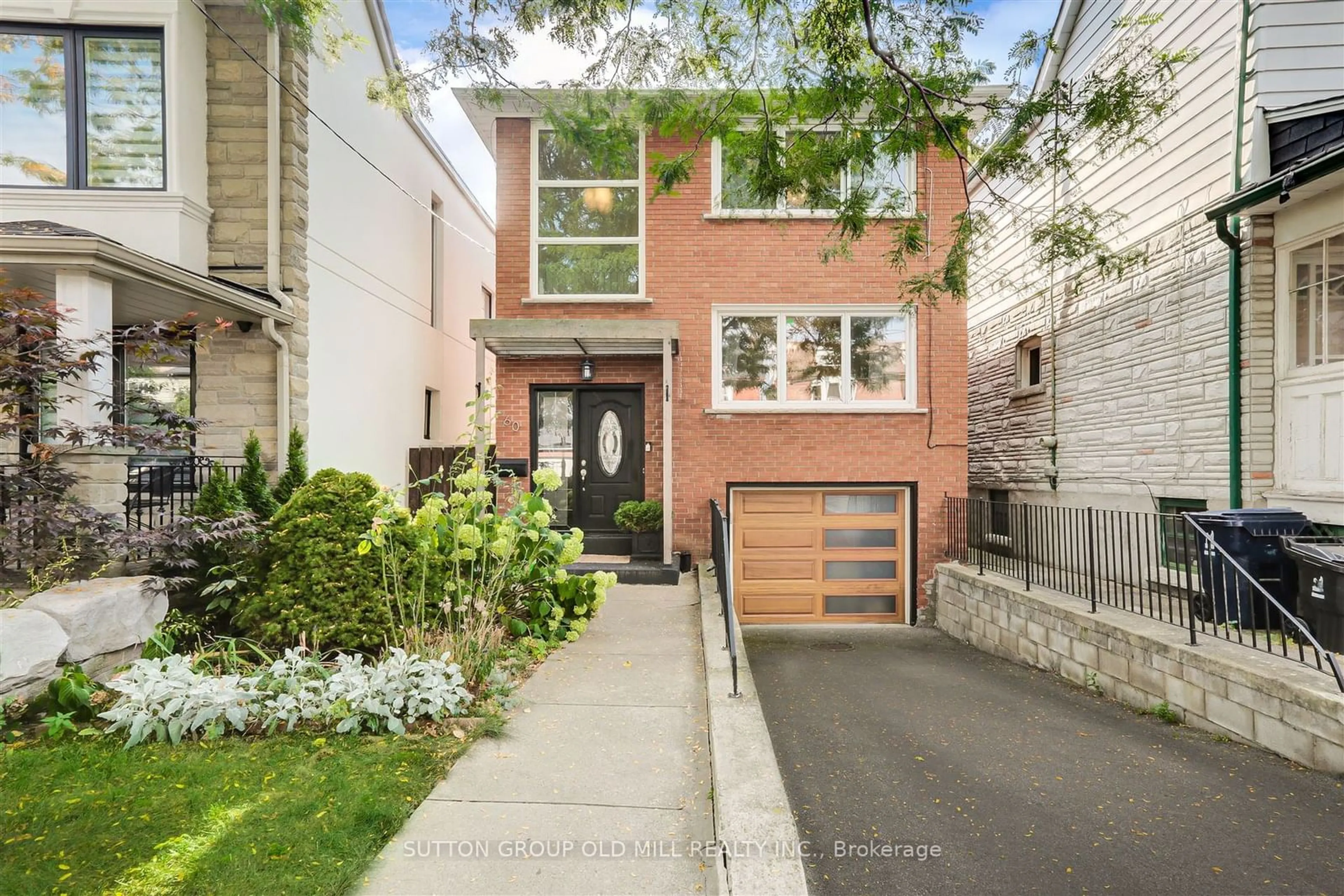 Frontside or backside of a home, the street view for 60 Carrick Ave, Toronto Ontario M6N 3J5