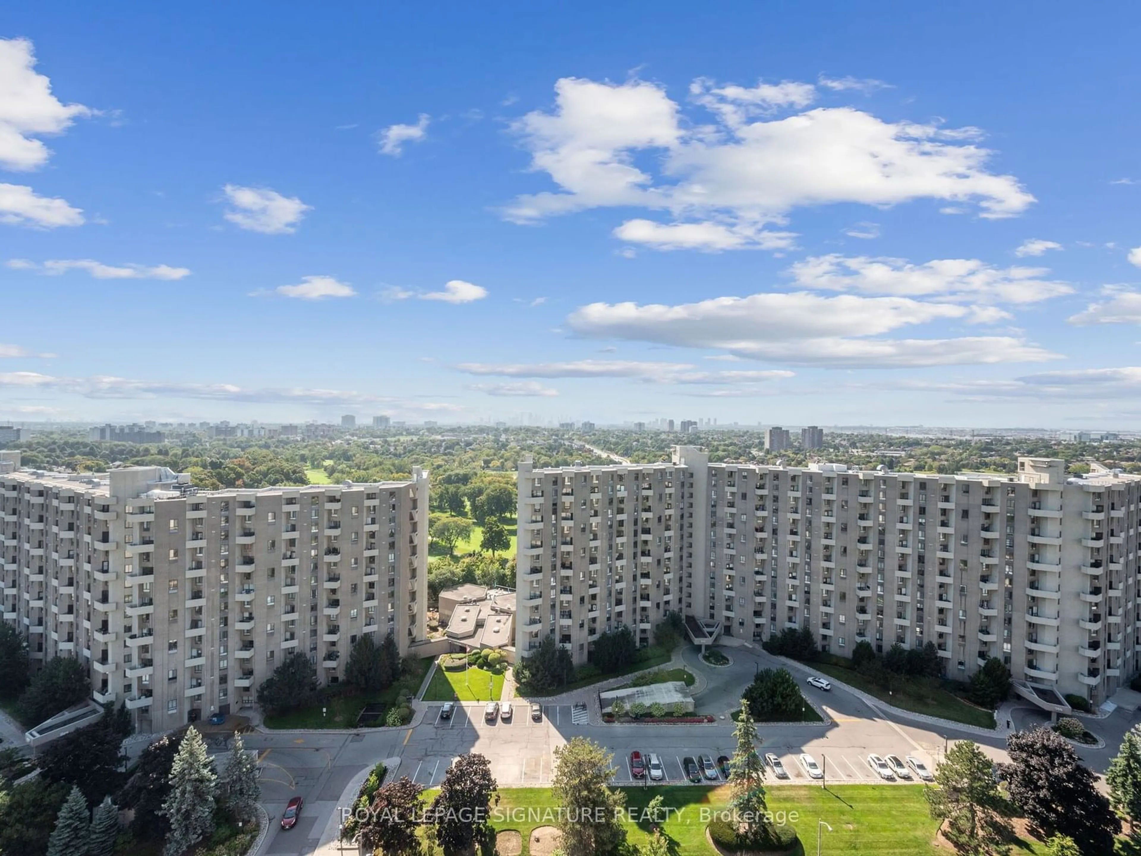 A pic from exterior of the house or condo, the view of city buildings for 299 Mill Rd #2201, Toronto Ontario M9C 4V9