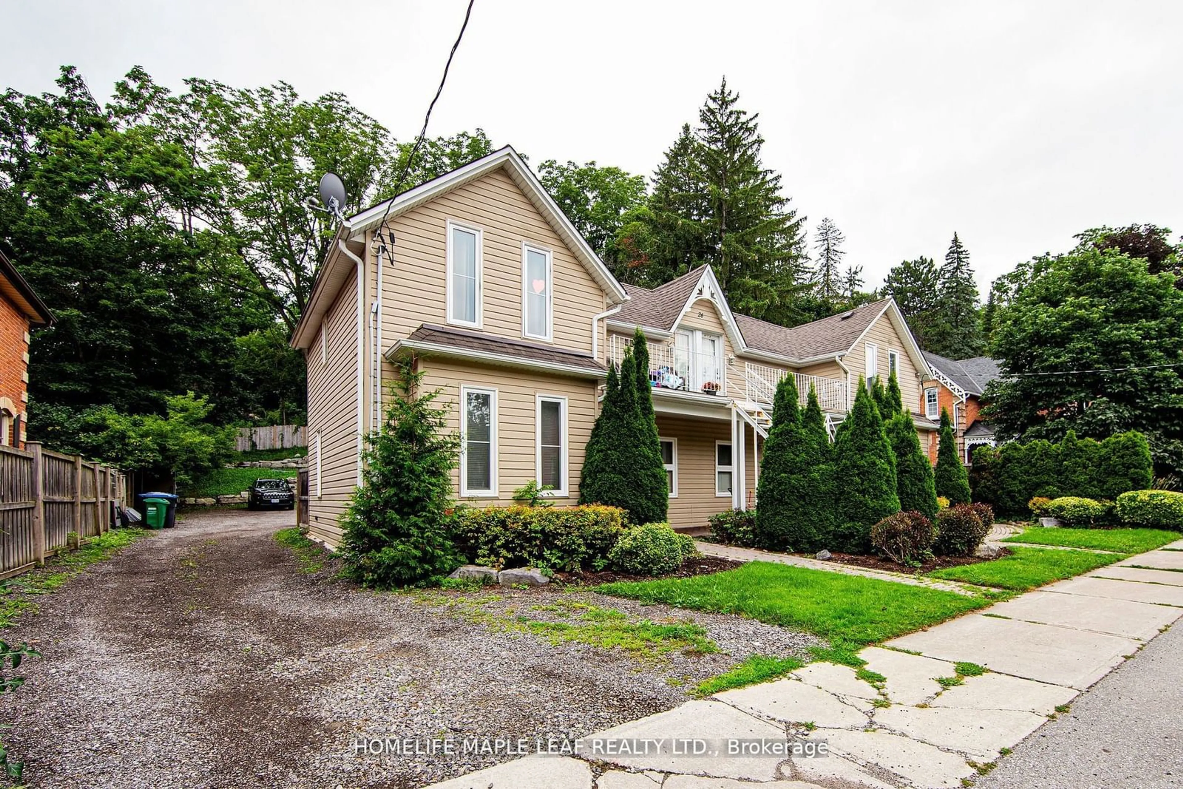 Frontside or backside of a home for 24-26 Temperance St, Caledon Ontario L7E 1B9