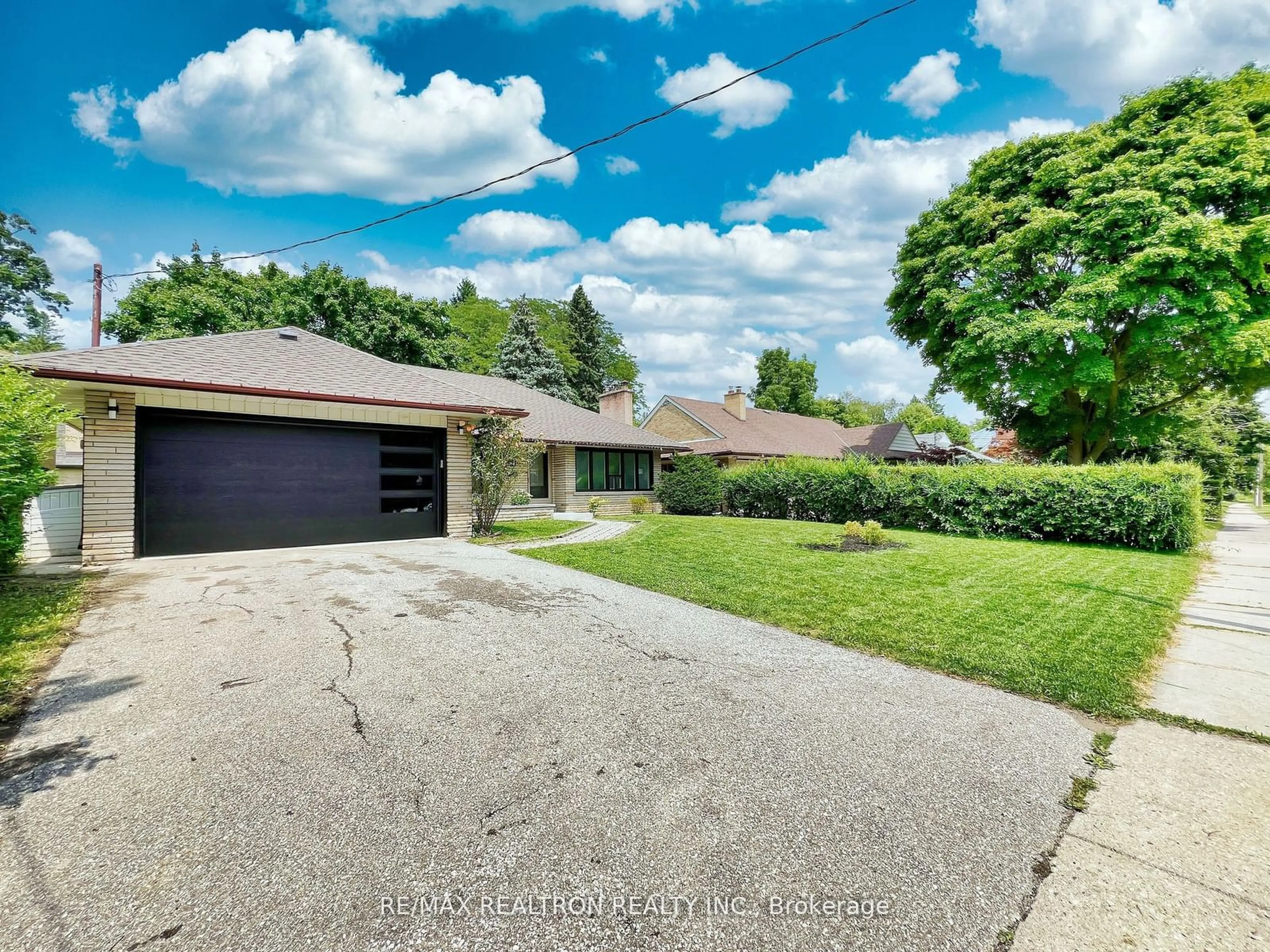 Frontside or backside of a home, the street view for 94 Anglesey Blvd, Toronto Ontario M9A 3C4