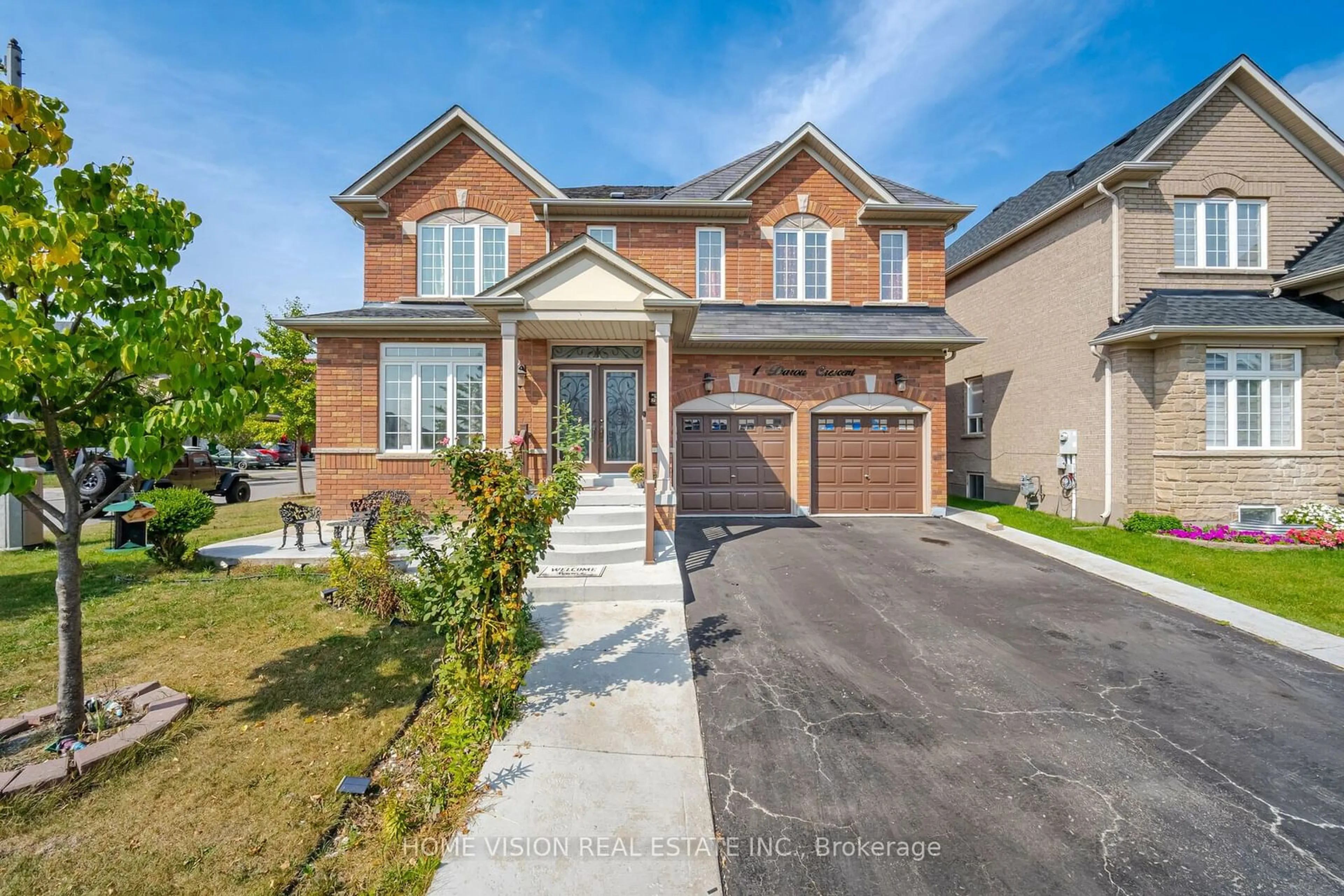 Home with brick exterior material for 1 Darou Cres, Brampton Ontario L6R 0N7