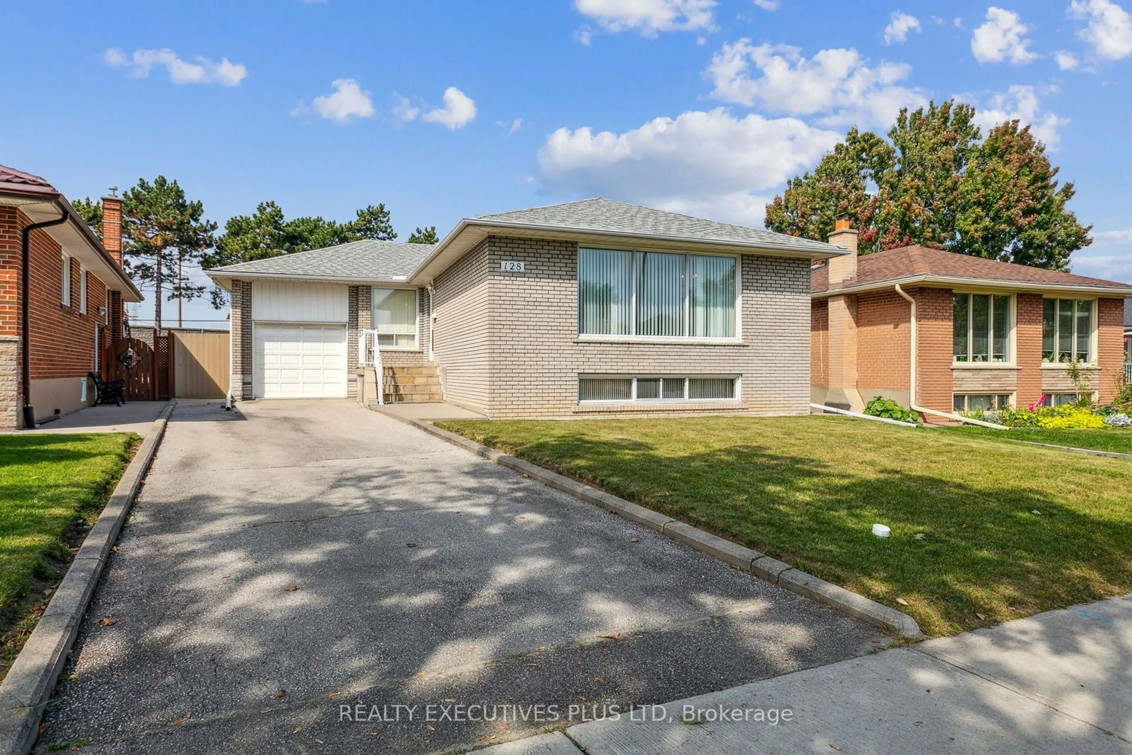 Frontside or backside of a home, the fenced backyard for 128 Kingsview Blvd, Toronto Ontario M9R 1V5