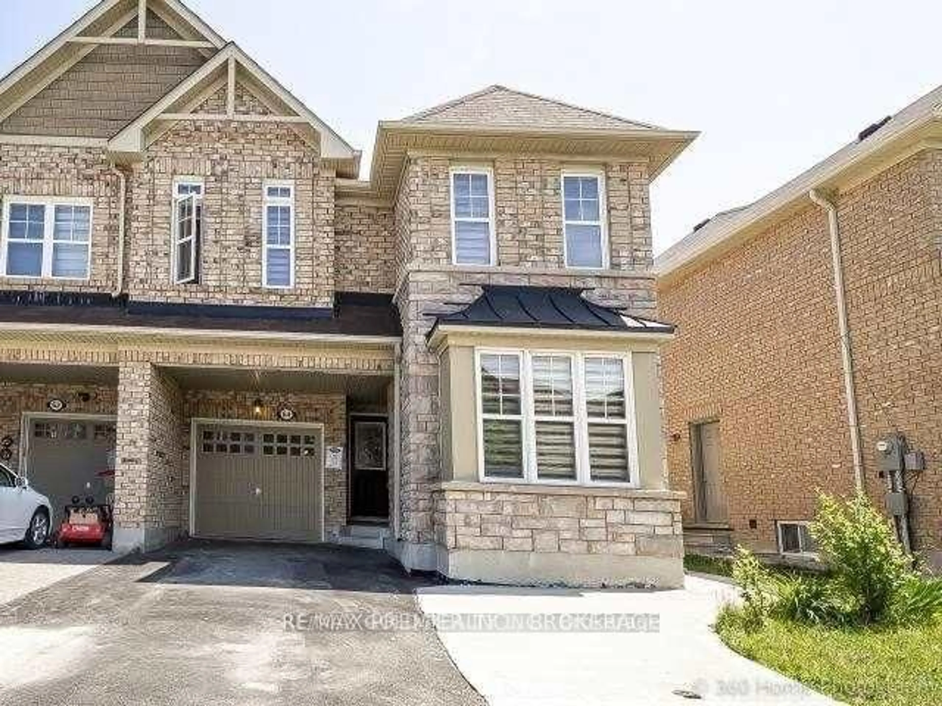 Home with brick exterior material for 64 Biddens Sq, Brampton Ontario L6P 3P9