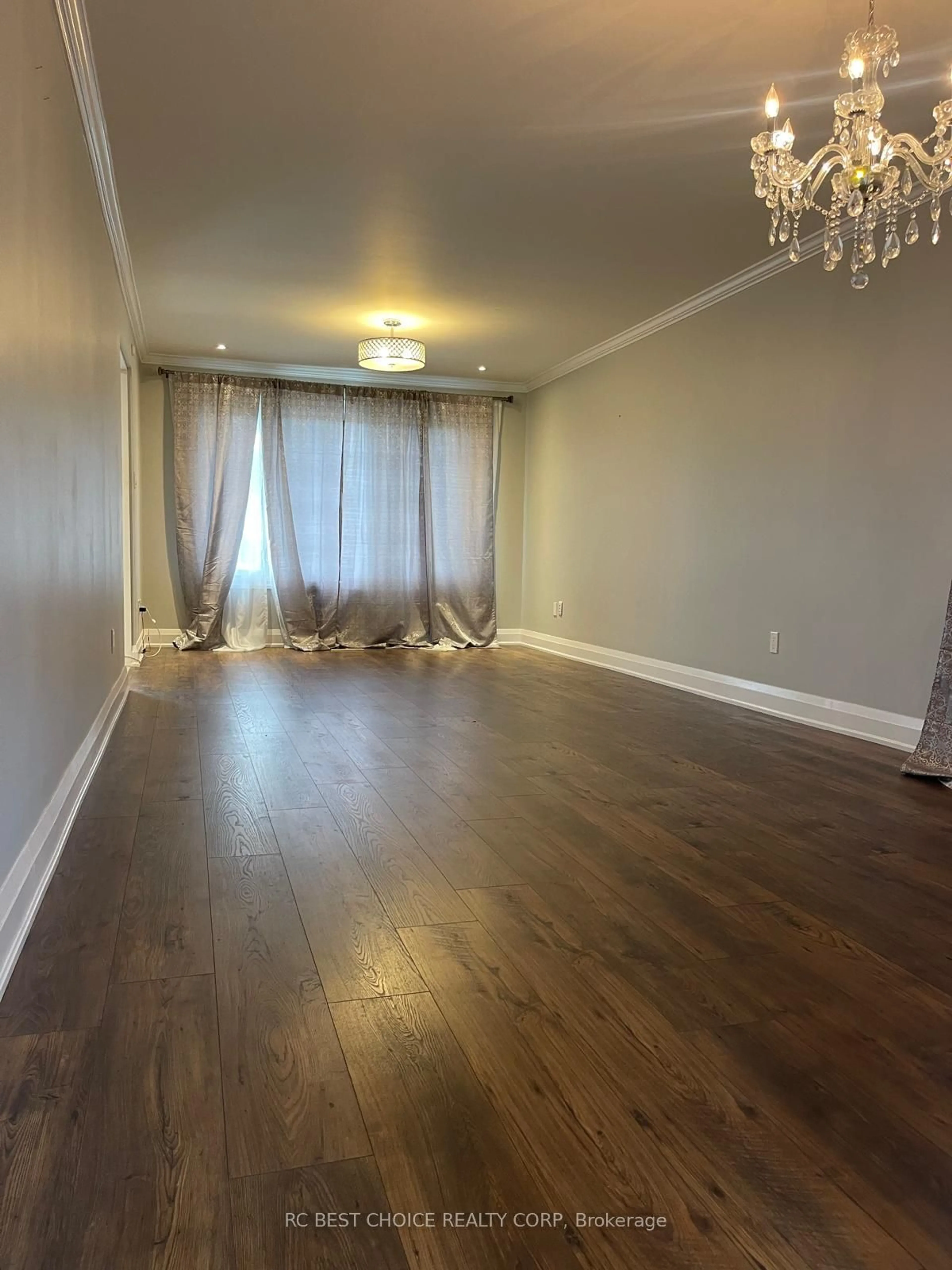 A pic of a room, wood floors for 44 Linkdale Rd, Brampton Ontario L6V 2Y6