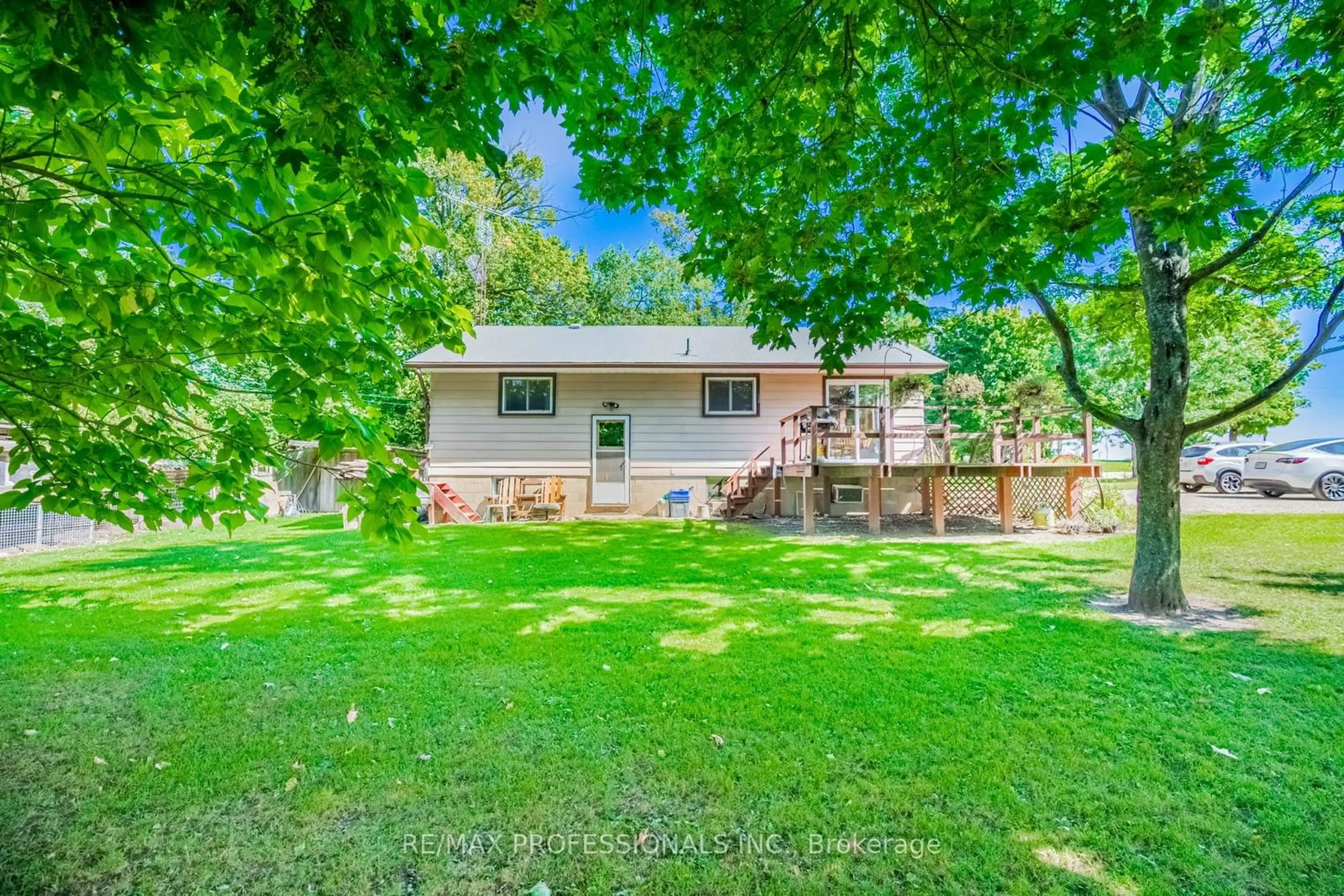 Frontside or backside of a home, the fenced backyard for 13958 Trafalgar Rd, Halton Hills Ontario L7G 4S4