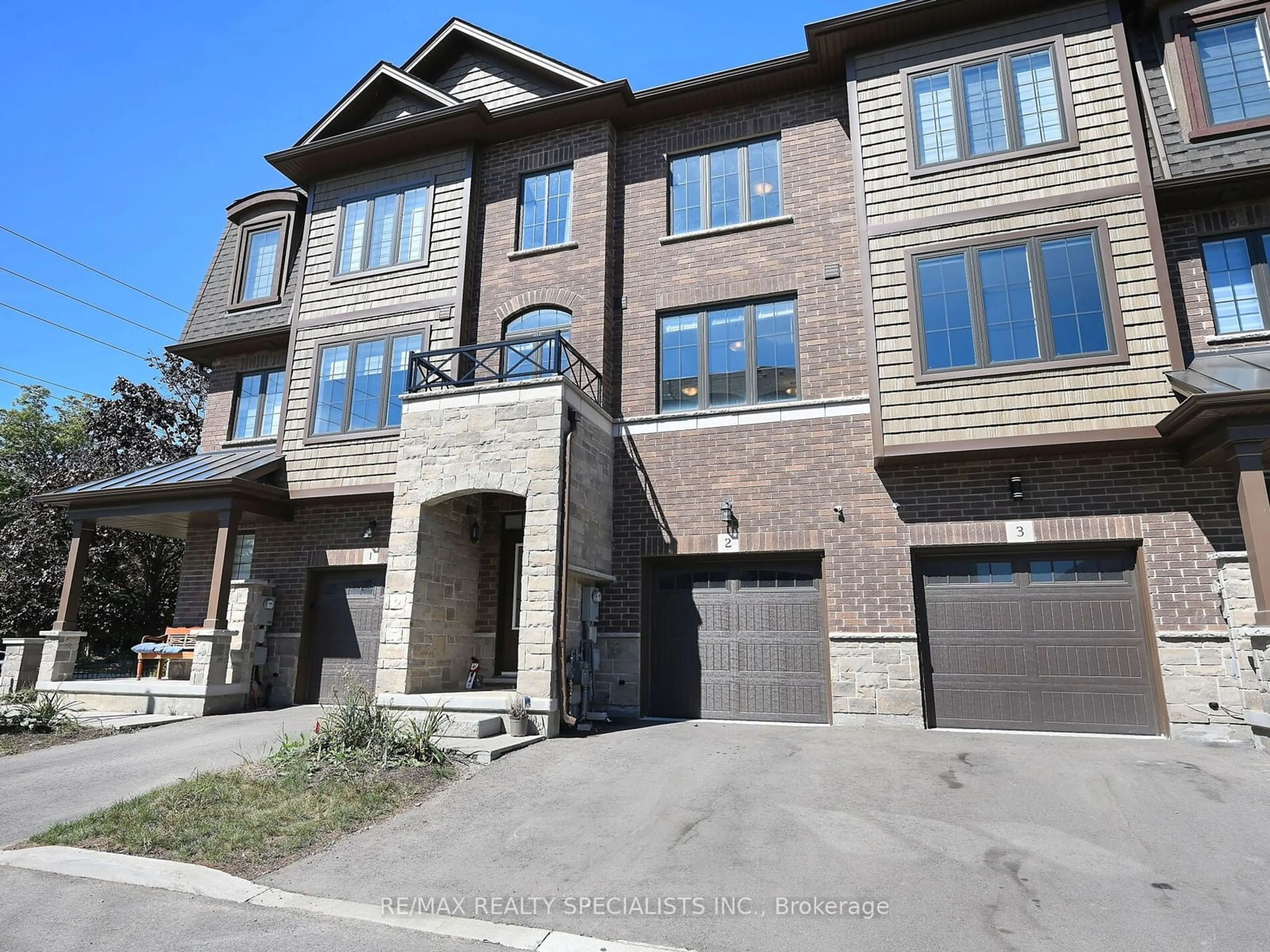 Home with brick exterior material for 445 Ontario St #2, Milton Ontario L9T 9K2