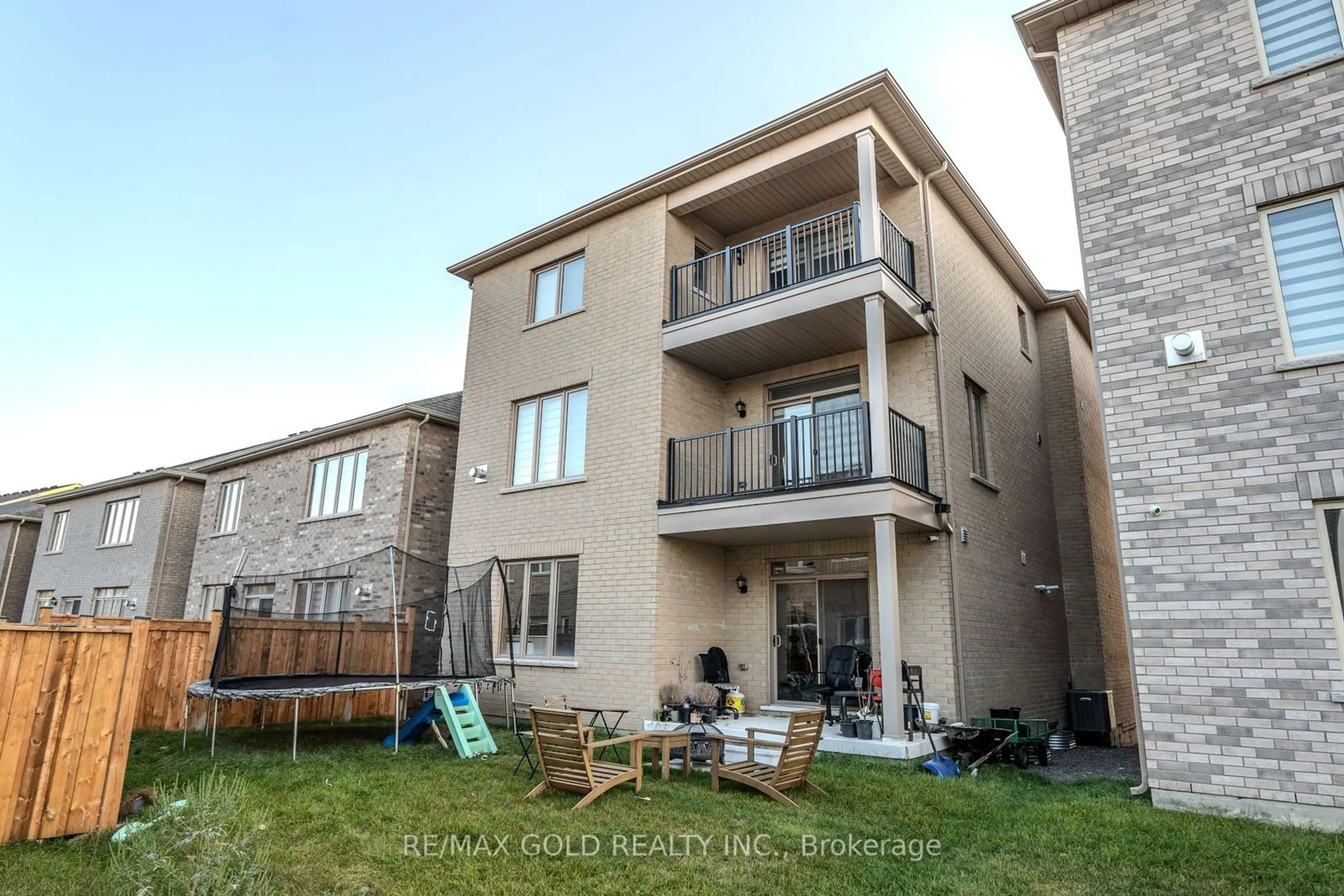 A pic from exterior of the house or condo, the fenced backyard for 269 Thornbush Blvd, Brampton Ontario L7A 5K1