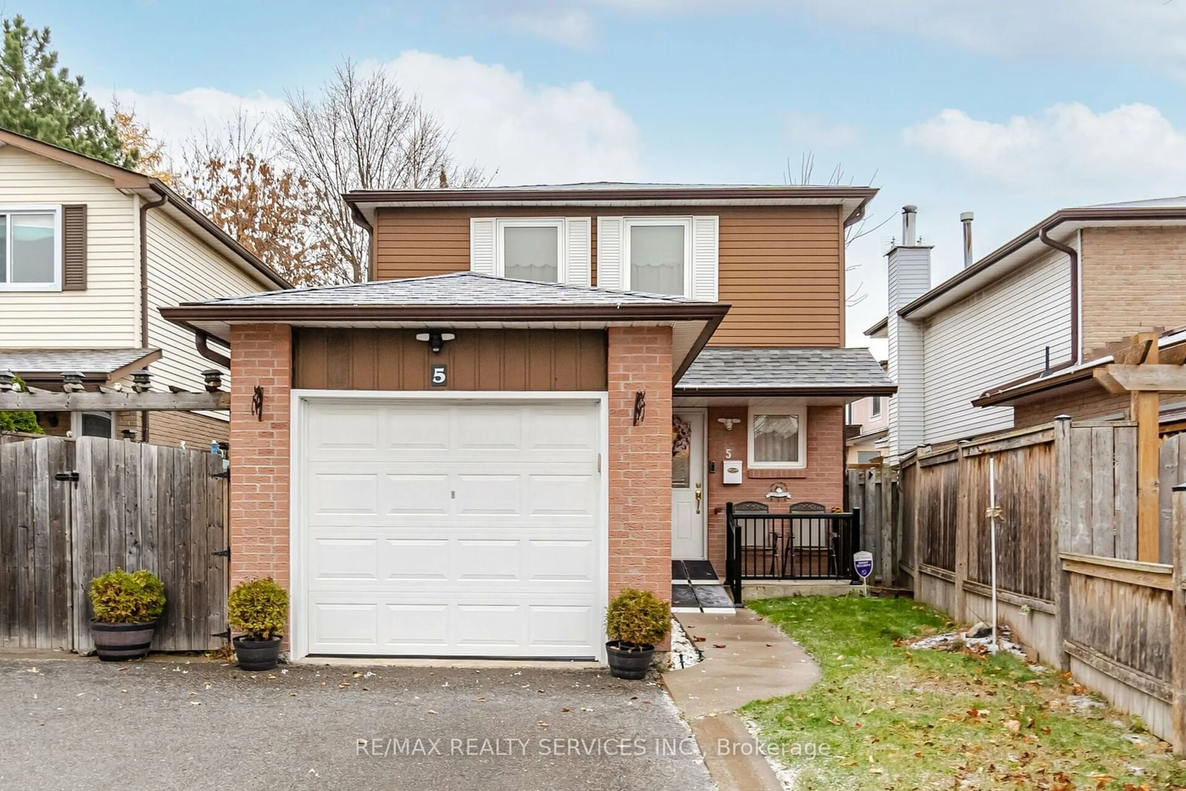 Frontside or backside of a home, the fenced backyard for 5 Greenleaf Cres, Brampton Ontario L6X 2V5