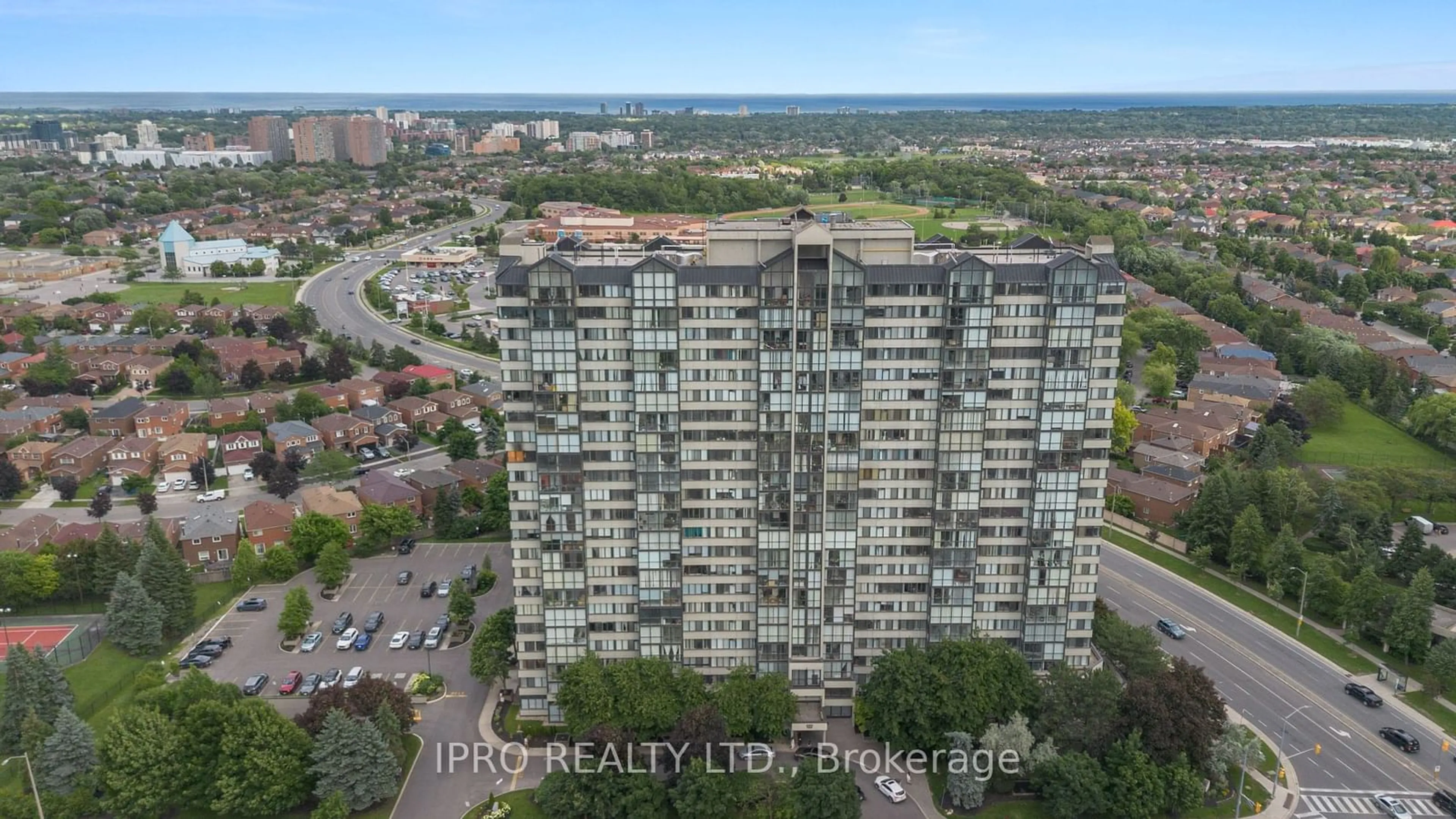 A pic from exterior of the house or condo, the view of city buildings for 350 Webb Dr #110, Mississauga Ontario L5B 3W4