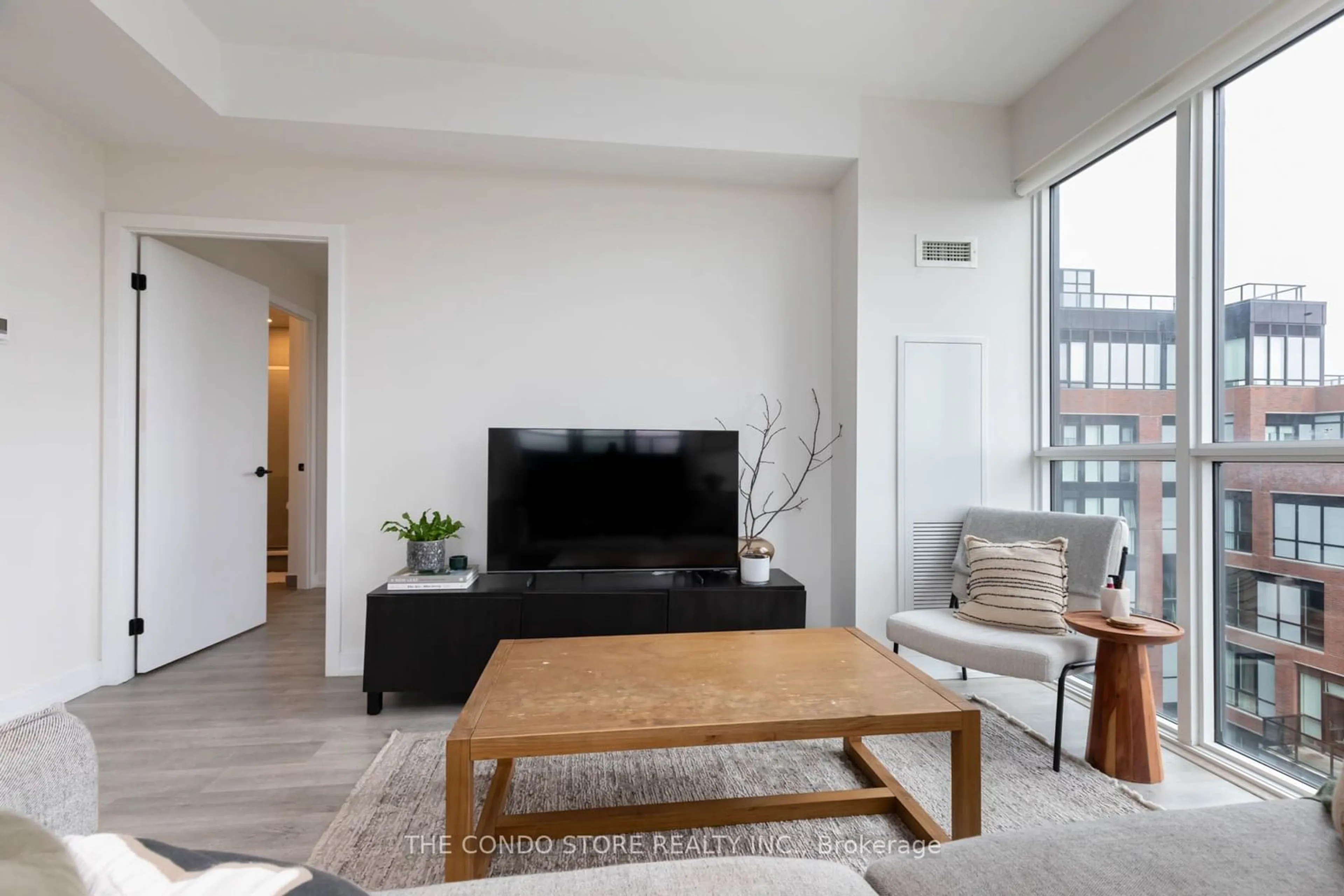 Living room, wood floors for 2300 St. Clair Ave #907, Toronto Ontario M6N 1K8