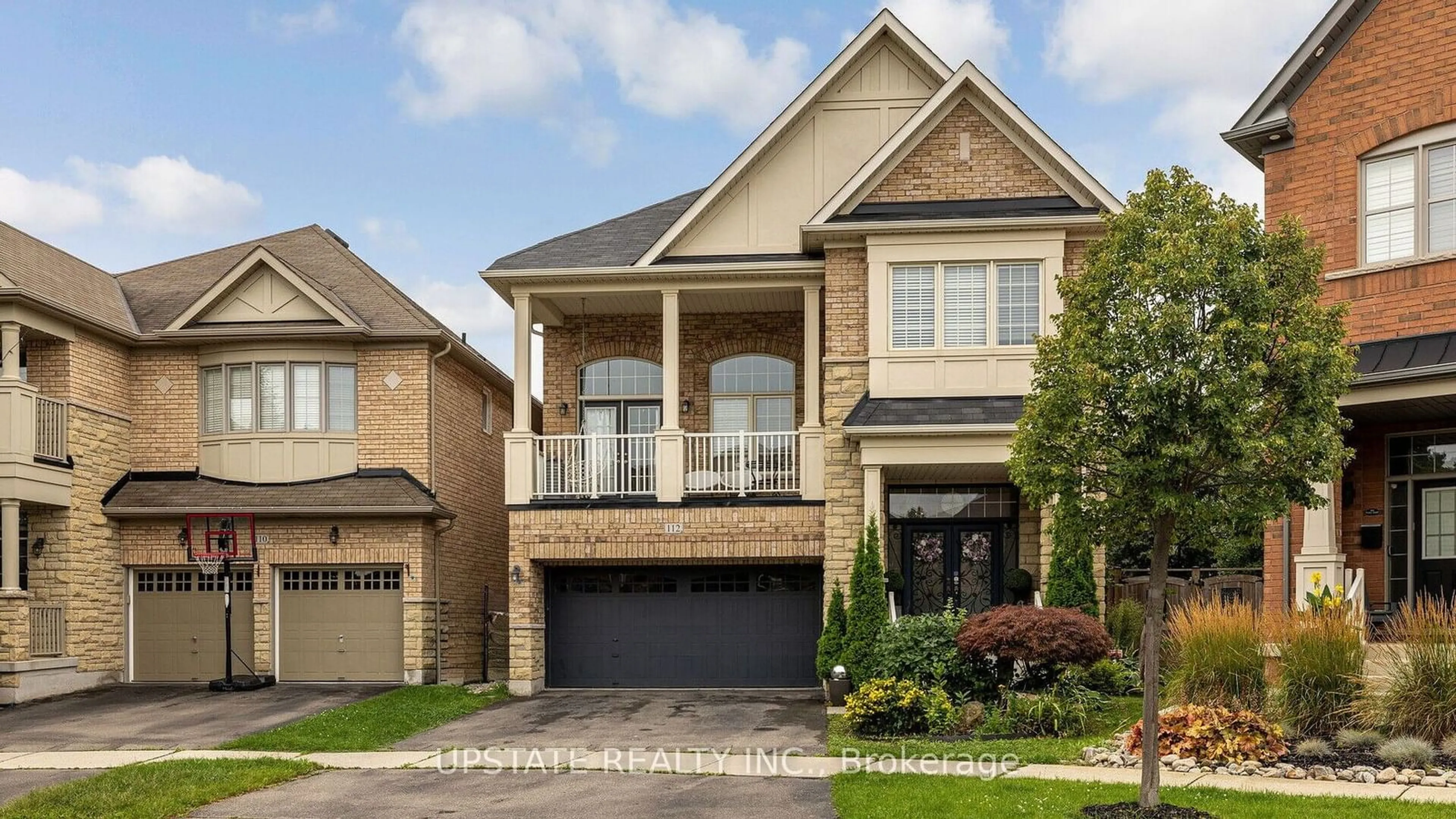 Home with brick exterior material for 112 George Robinson Dr, Brampton Ontario L6Y 0Z8