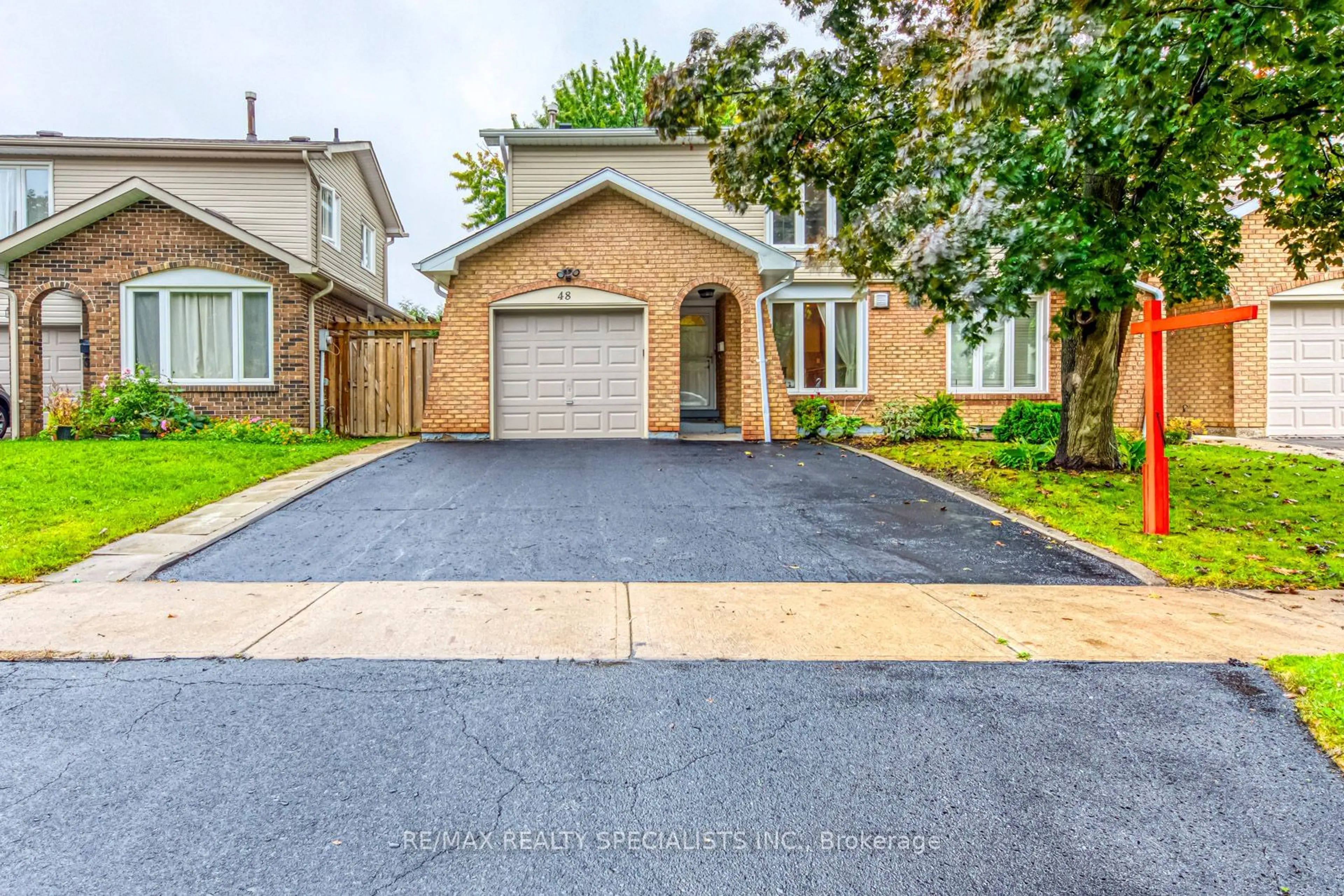 Home with brick exterior material for 48 Camberley Cres, Brampton Ontario L6V 3L4