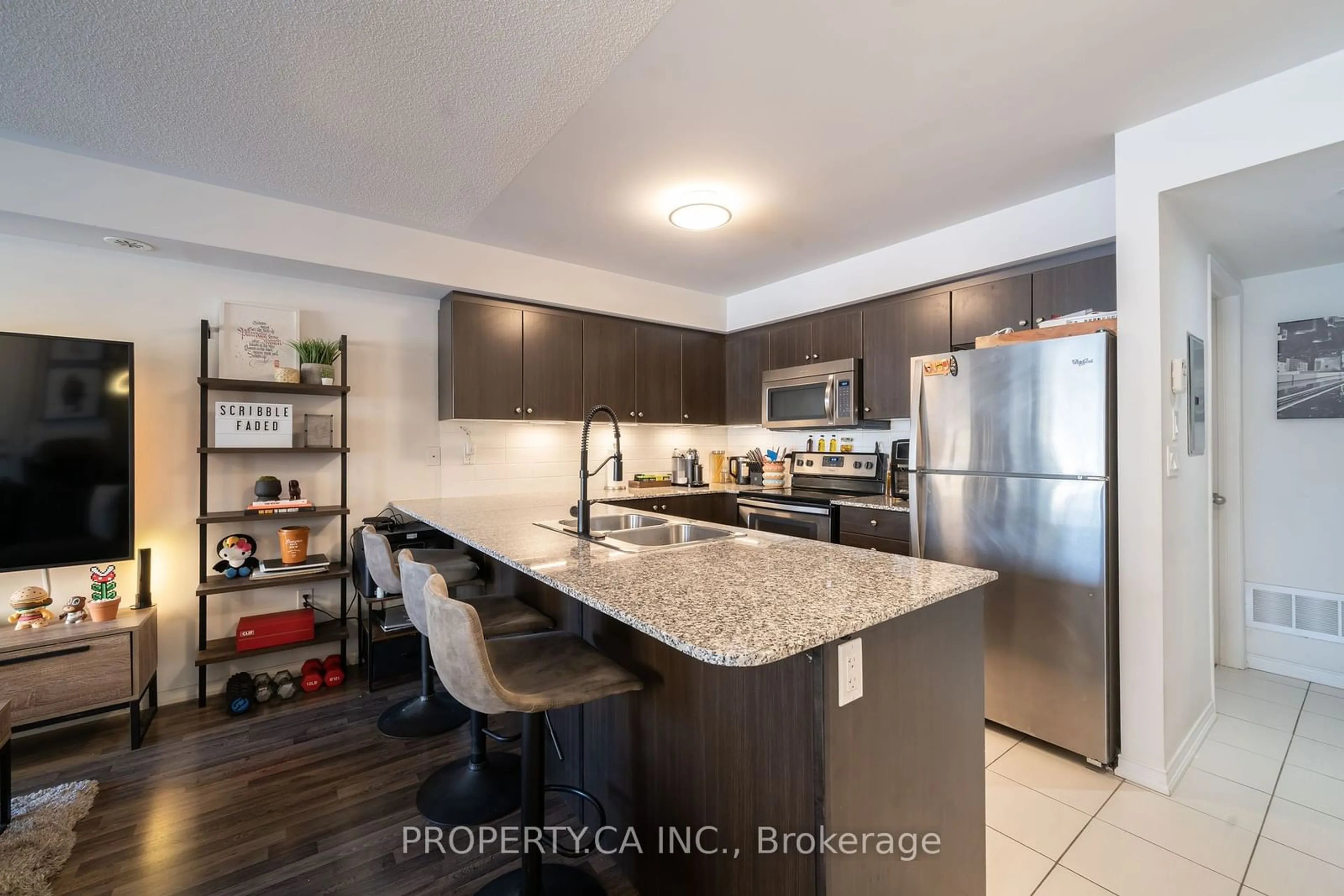 Open concept kitchen for 132 Widdicombe Hill Blvd #306, Toronto Ontario M9R 0A6