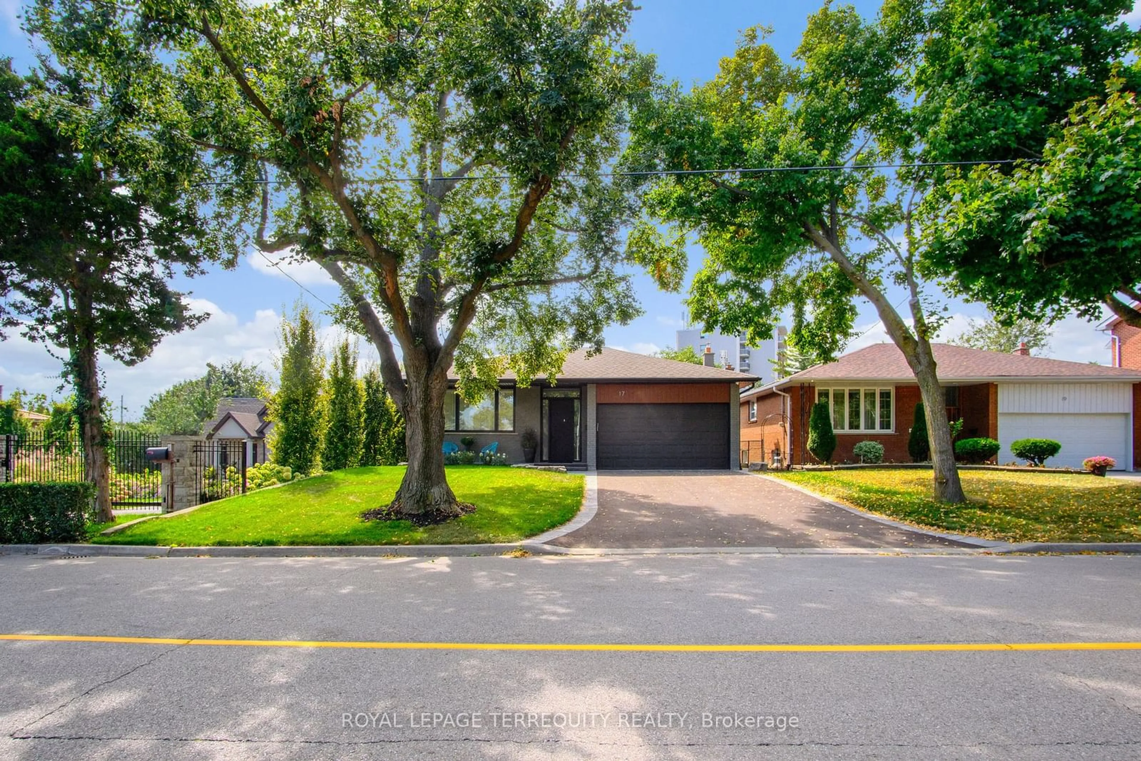 Frontside or backside of a home, the street view for 17 Old Burnhamthorpe Rd, Toronto Ontario M9C 3J3