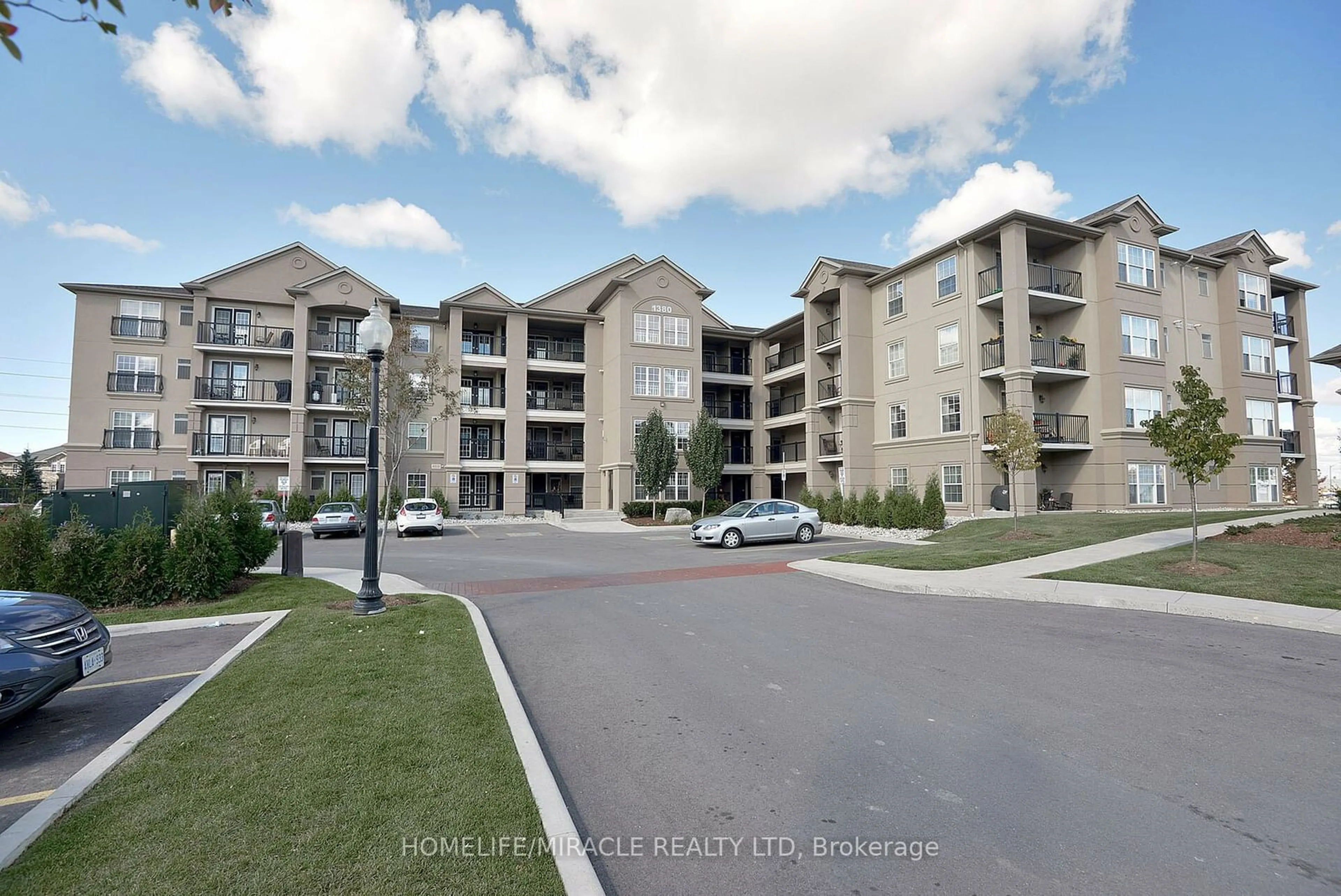 A pic from exterior of the house or condo, the street view for 1380 Main St #305, Milton Ontario L9T 7S4