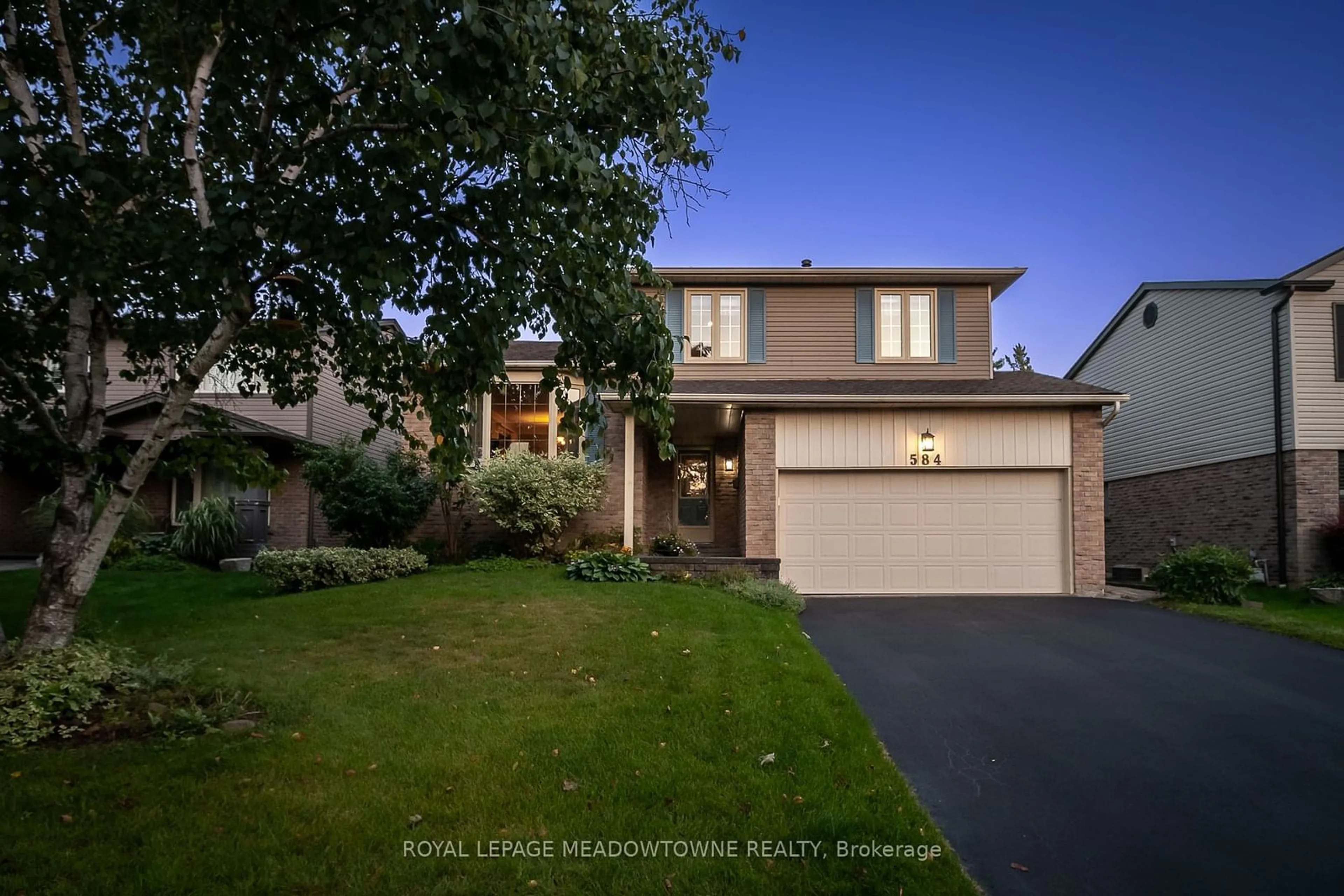 Frontside or backside of a home for 584 Moorelands Cres, Milton Ontario L9T 4B5