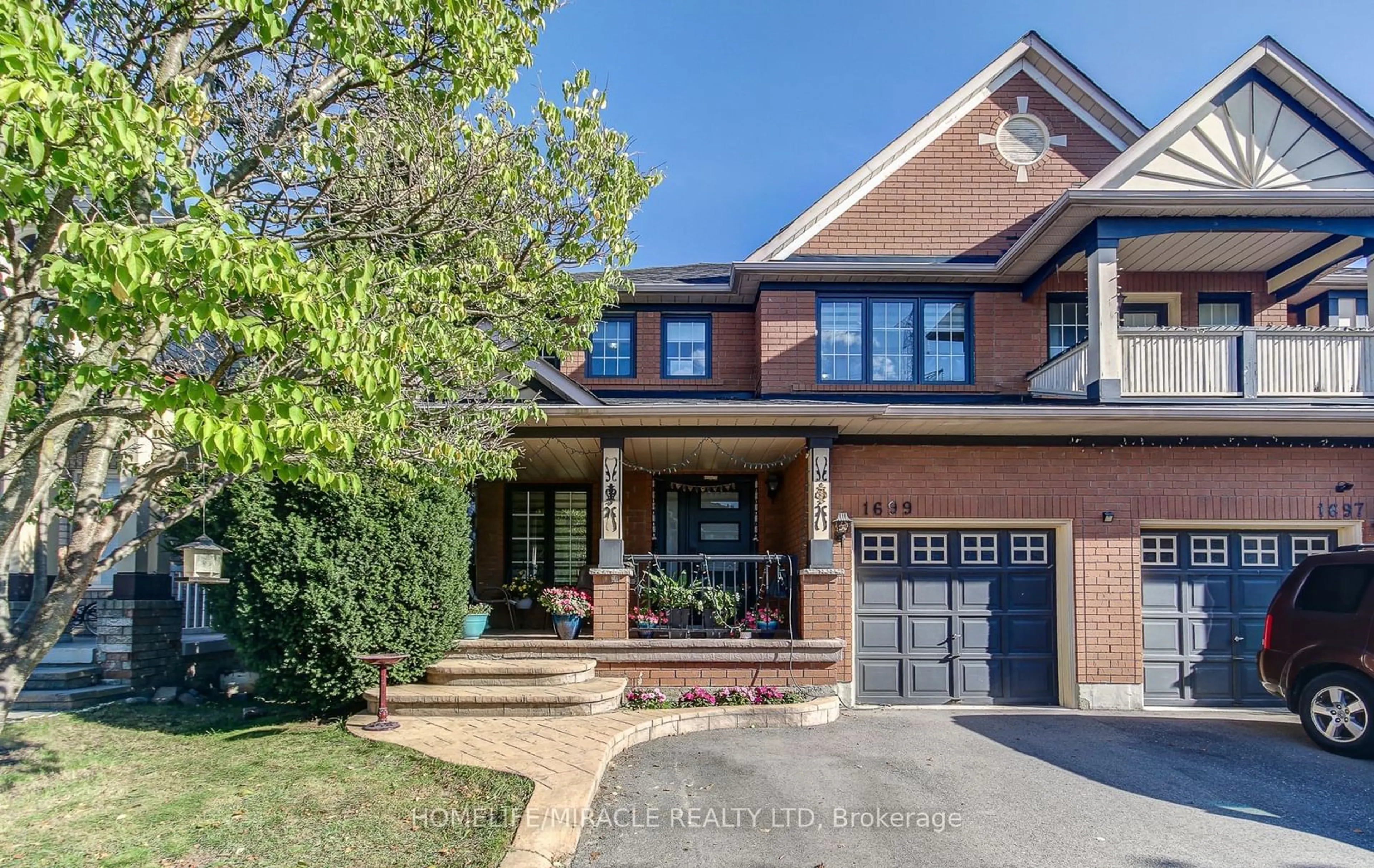 Home with brick exterior material for 1699 Samuelson Circ, Mississauga Ontario L5N 7Z8