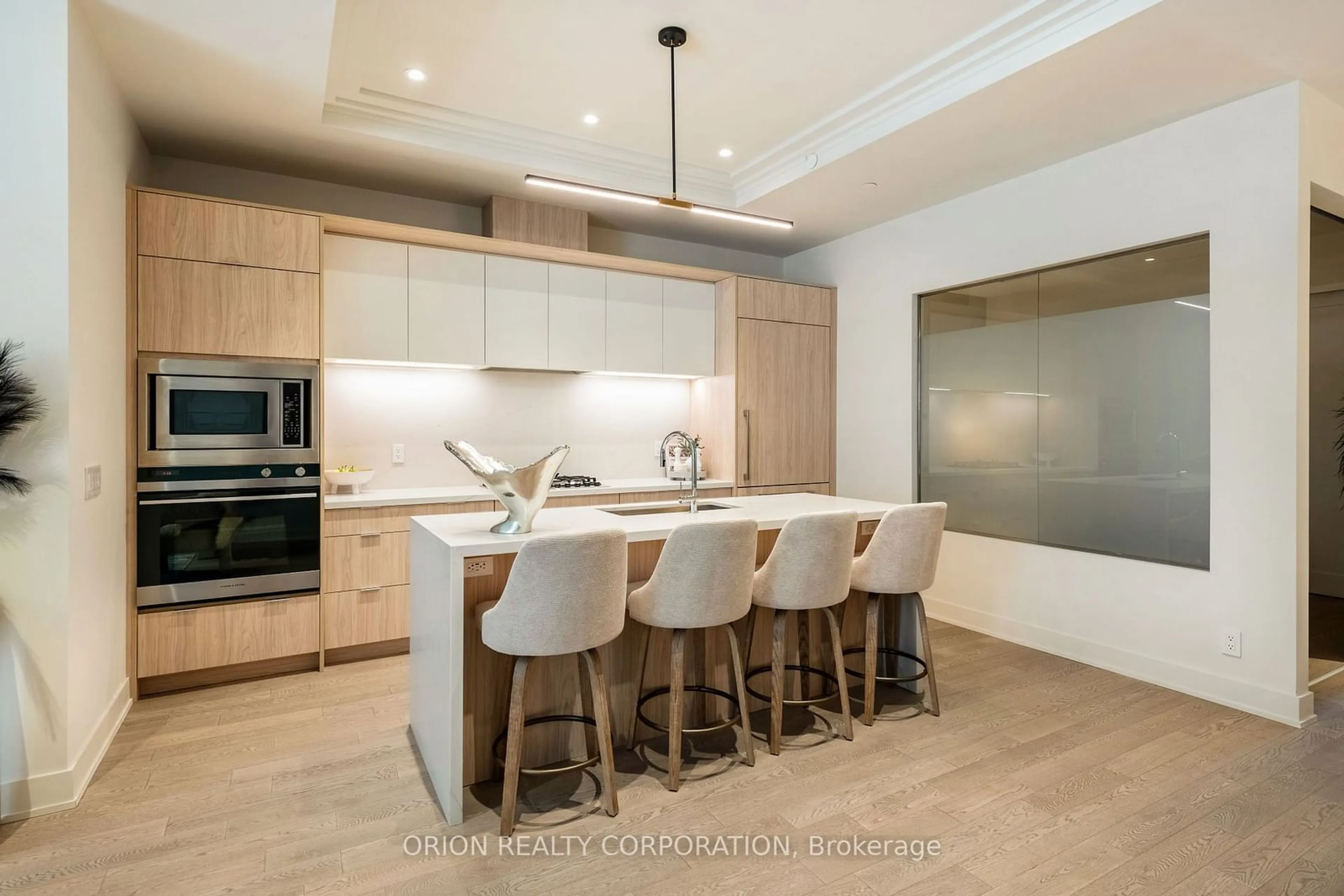 Contemporary kitchen, wood floors for 123 Maurice Dr #105, Oakville Ontario L6K 2W6