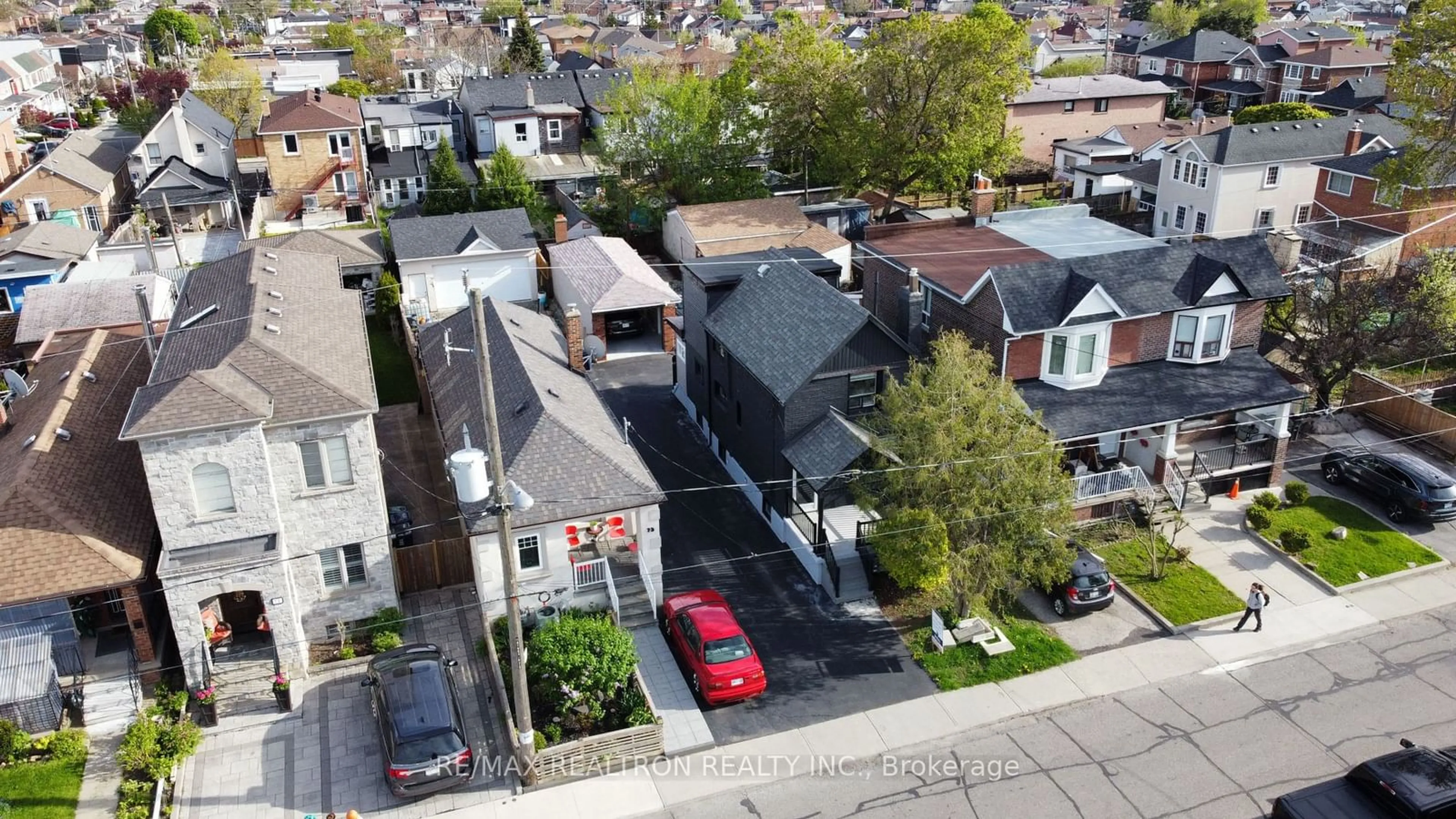 A pic from exterior of the house or condo, the street view for 77 Hatherley Rd, Toronto Ontario M6E 1V8