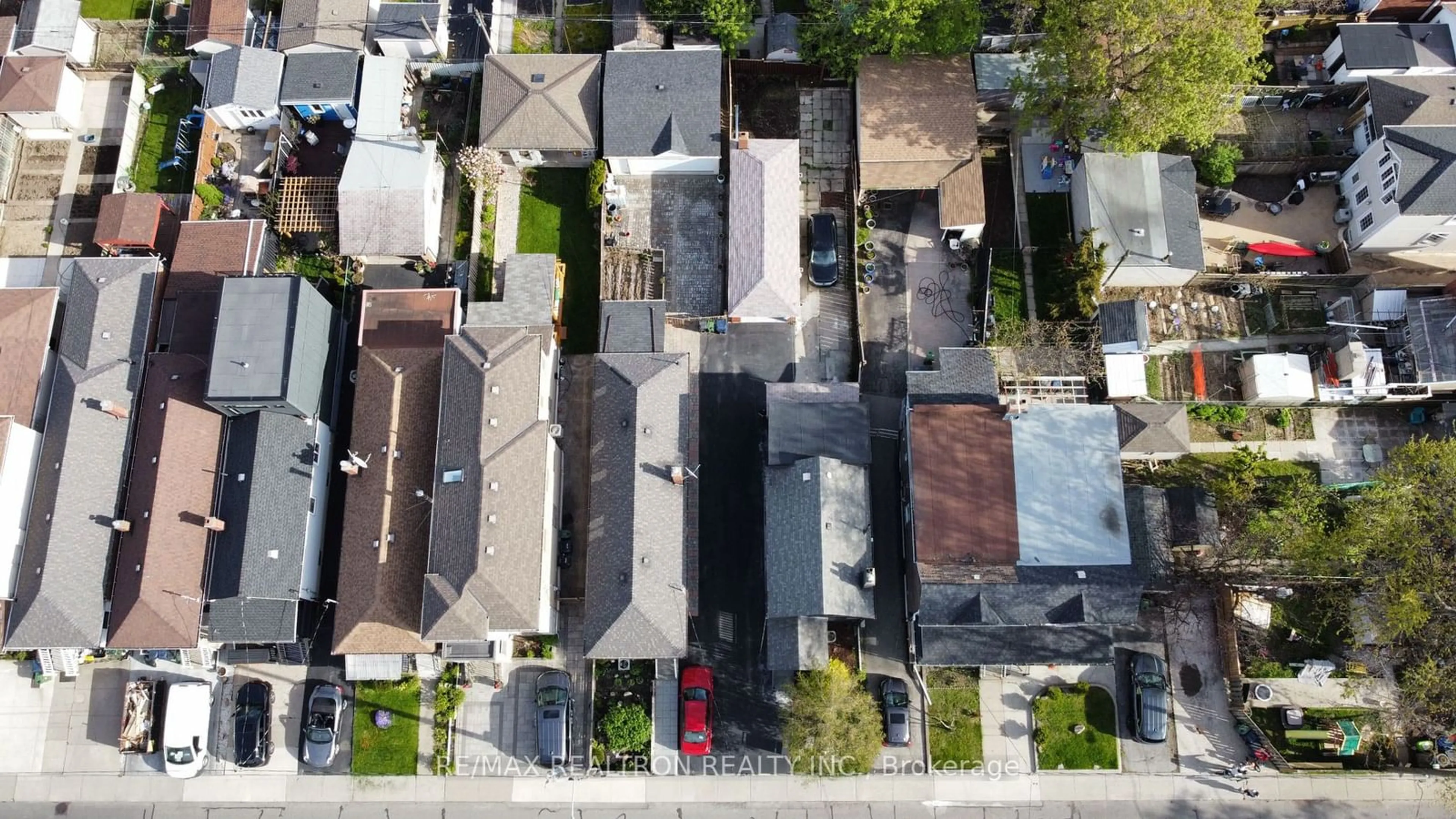 Frontside or backside of a home, the street view for 77 Hatherley Rd, Toronto Ontario M6E 1V8