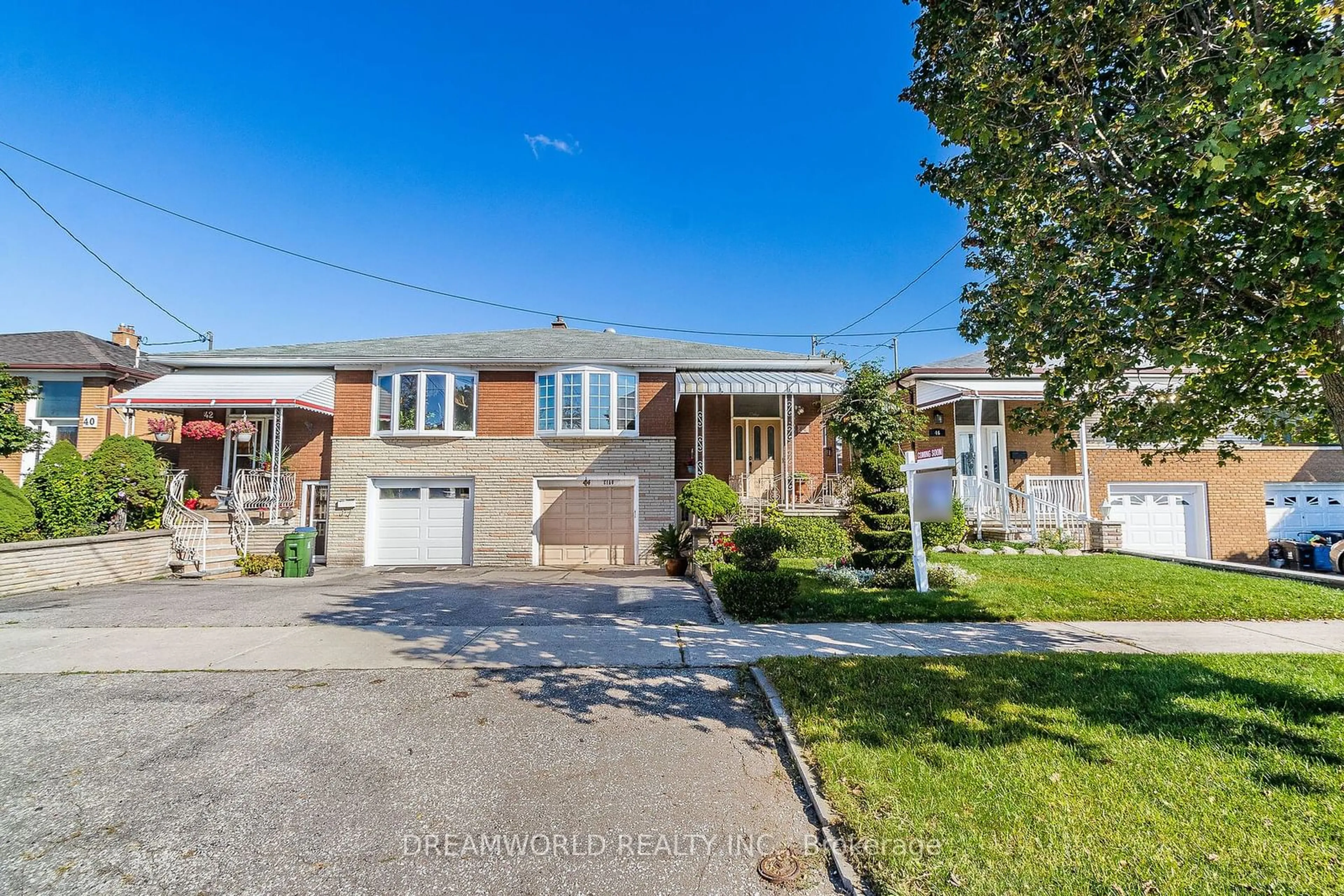 Frontside or backside of a home, the street view for 44 Watney Cres, Toronto Ontario M3L 2C9