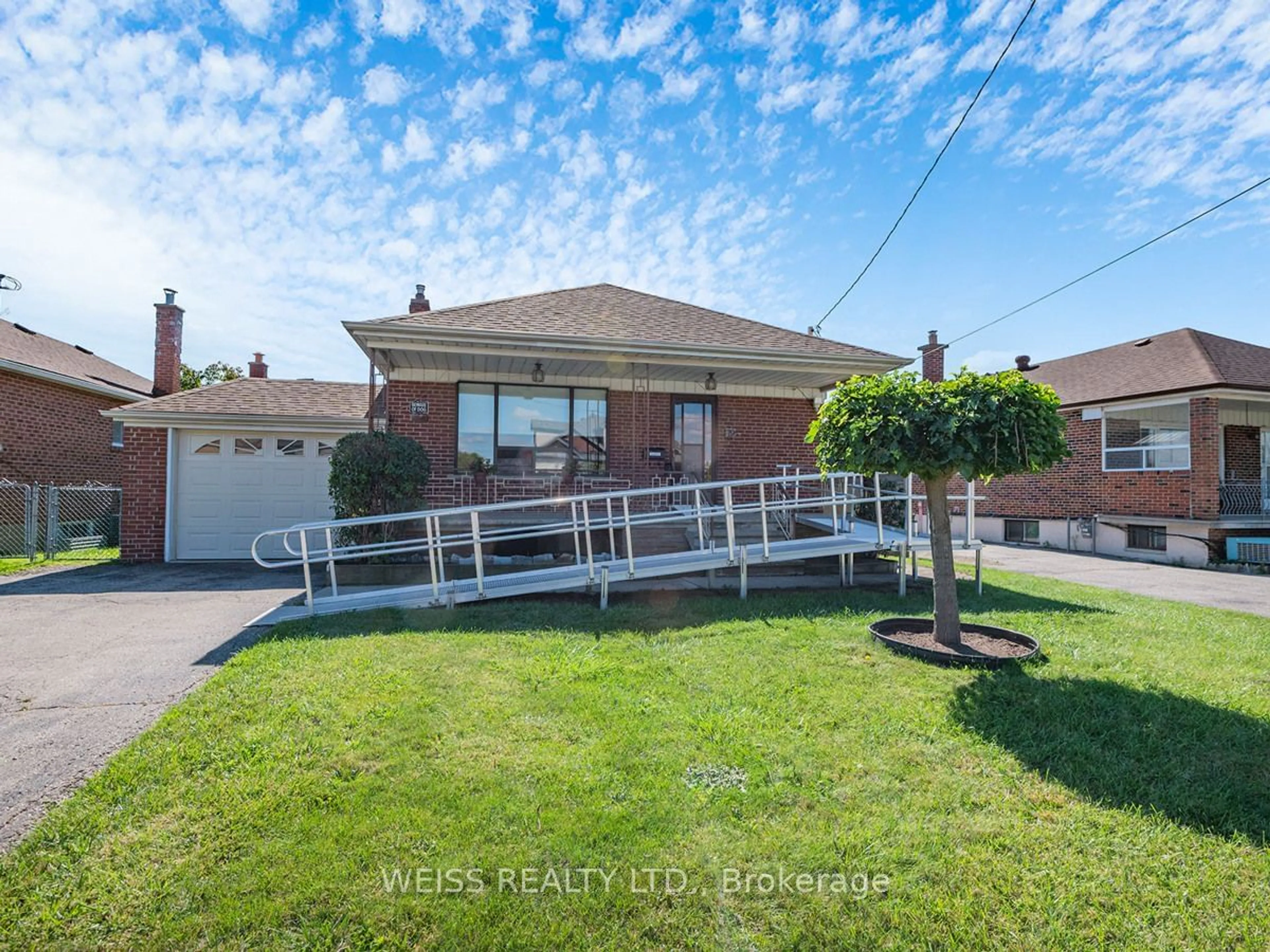 Frontside or backside of a home, the fenced backyard for 79 Cuffley Cres, Toronto Ontario M3K 1X6