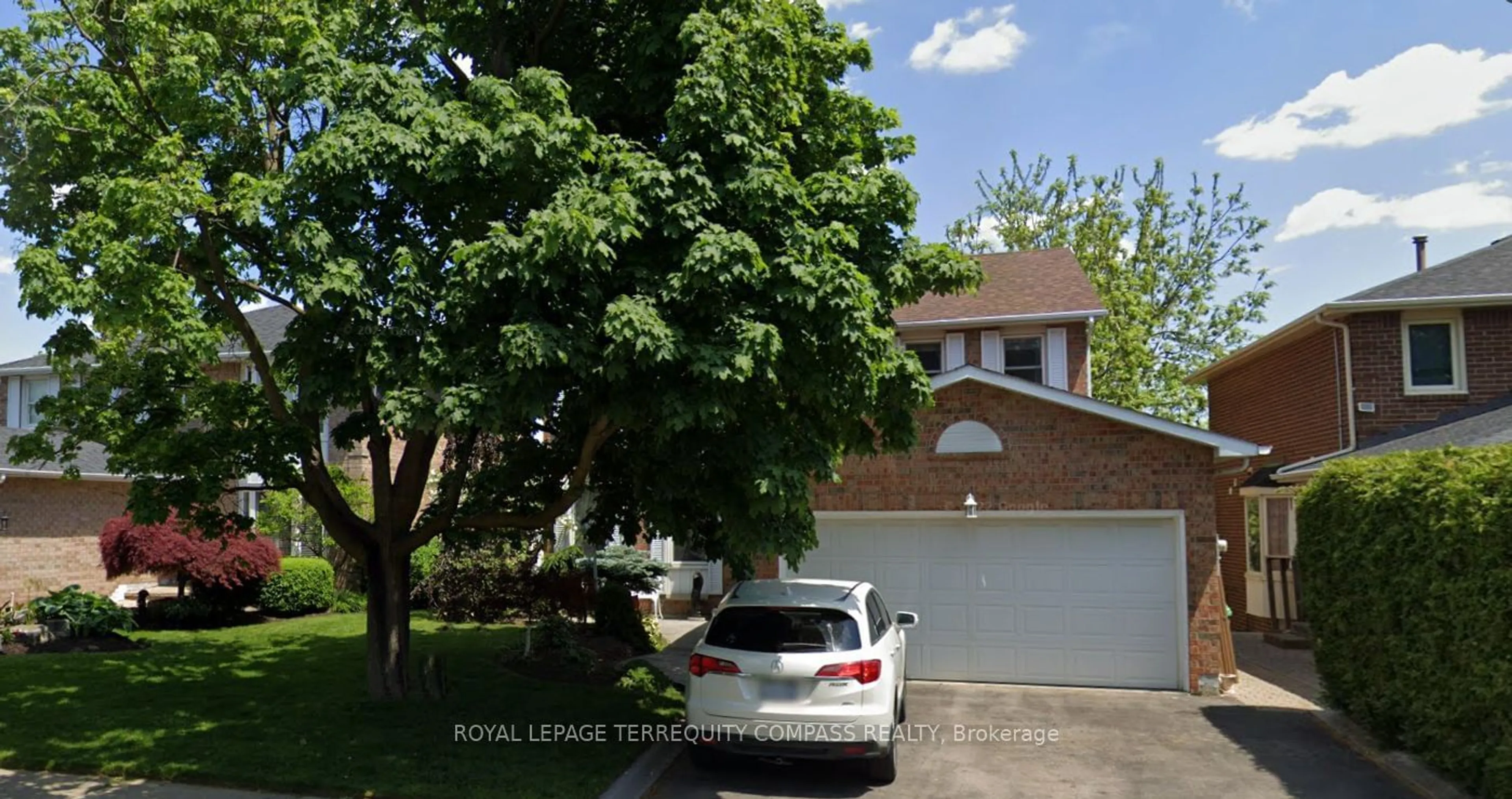 Frontside or backside of a home, the street view for 4 Esker Dr, Brampton Ontario L6Z 3C5