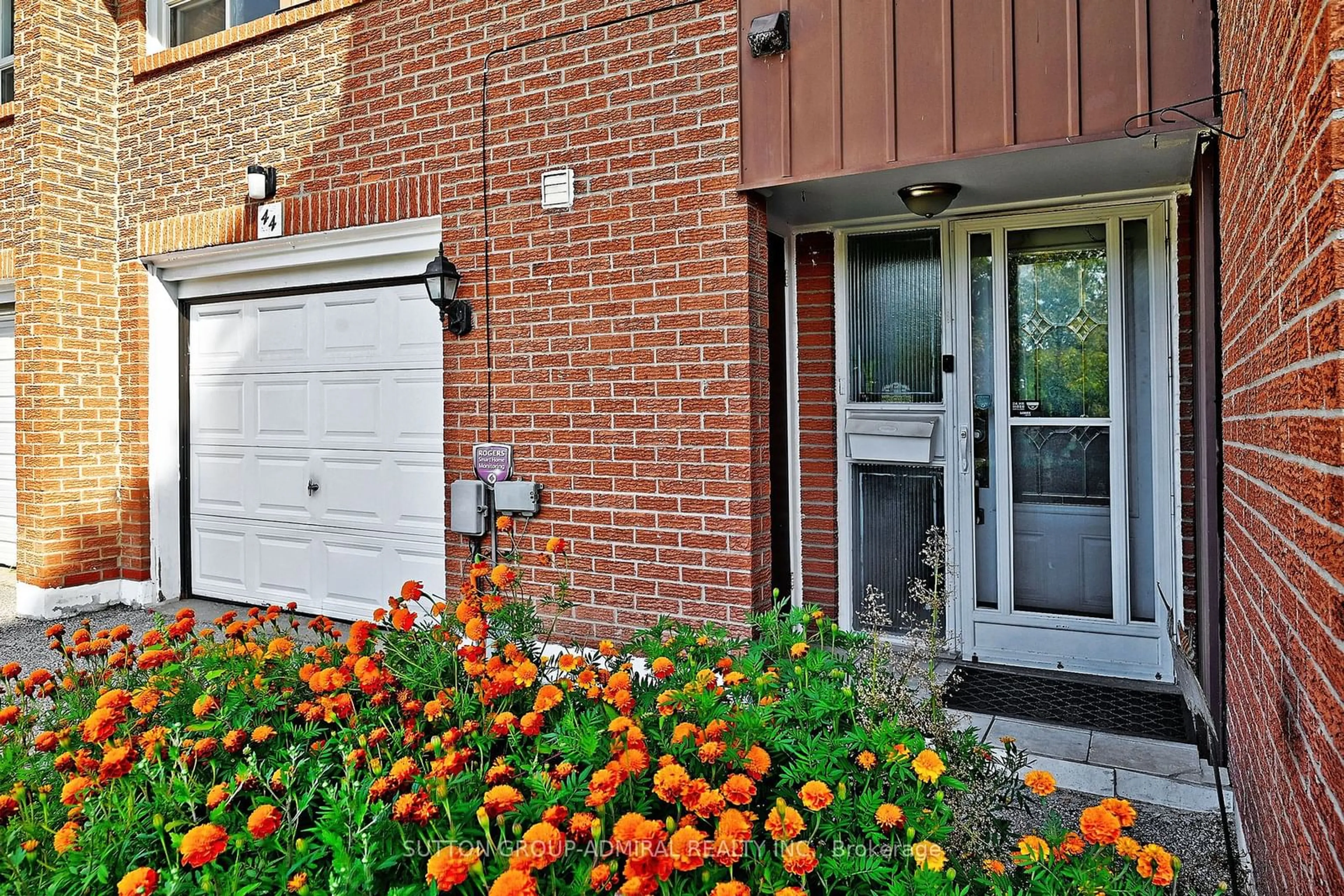 A pic from exterior of the house or condo, the street view for 452 Silverstone Dr #44, Toronto Ontario M9V 3K8