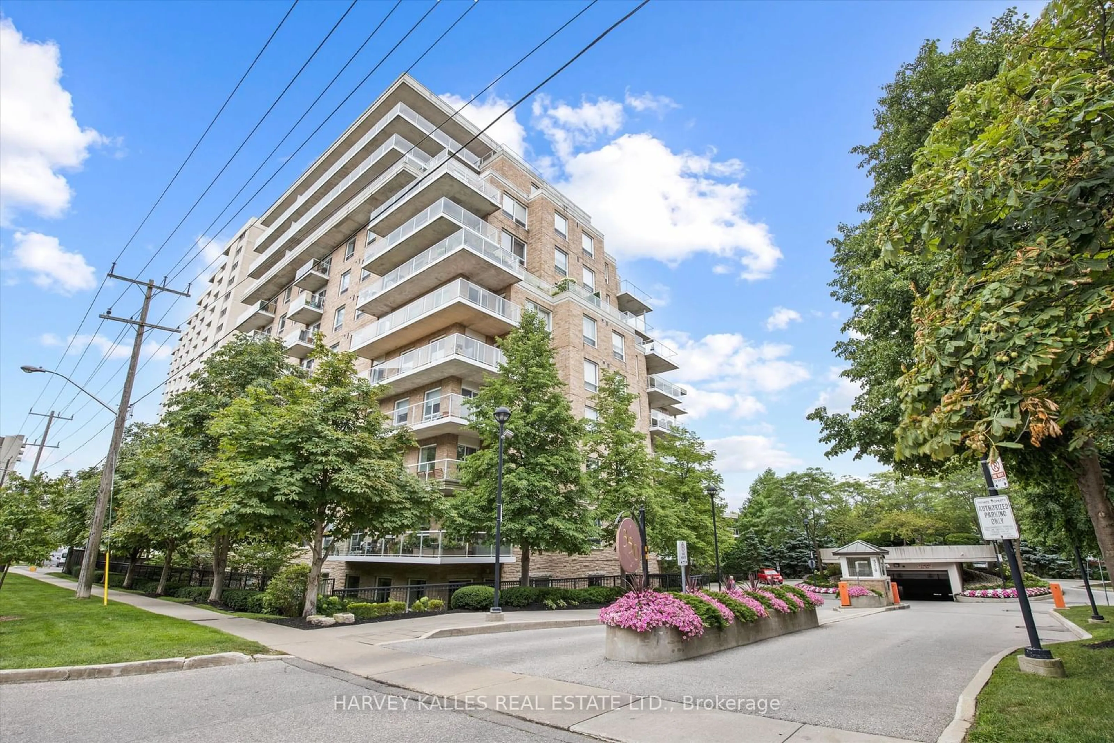 A pic from exterior of the house or condo, the street view for 350 Mill Rd #309, Toronto Ontario M9C 5R7