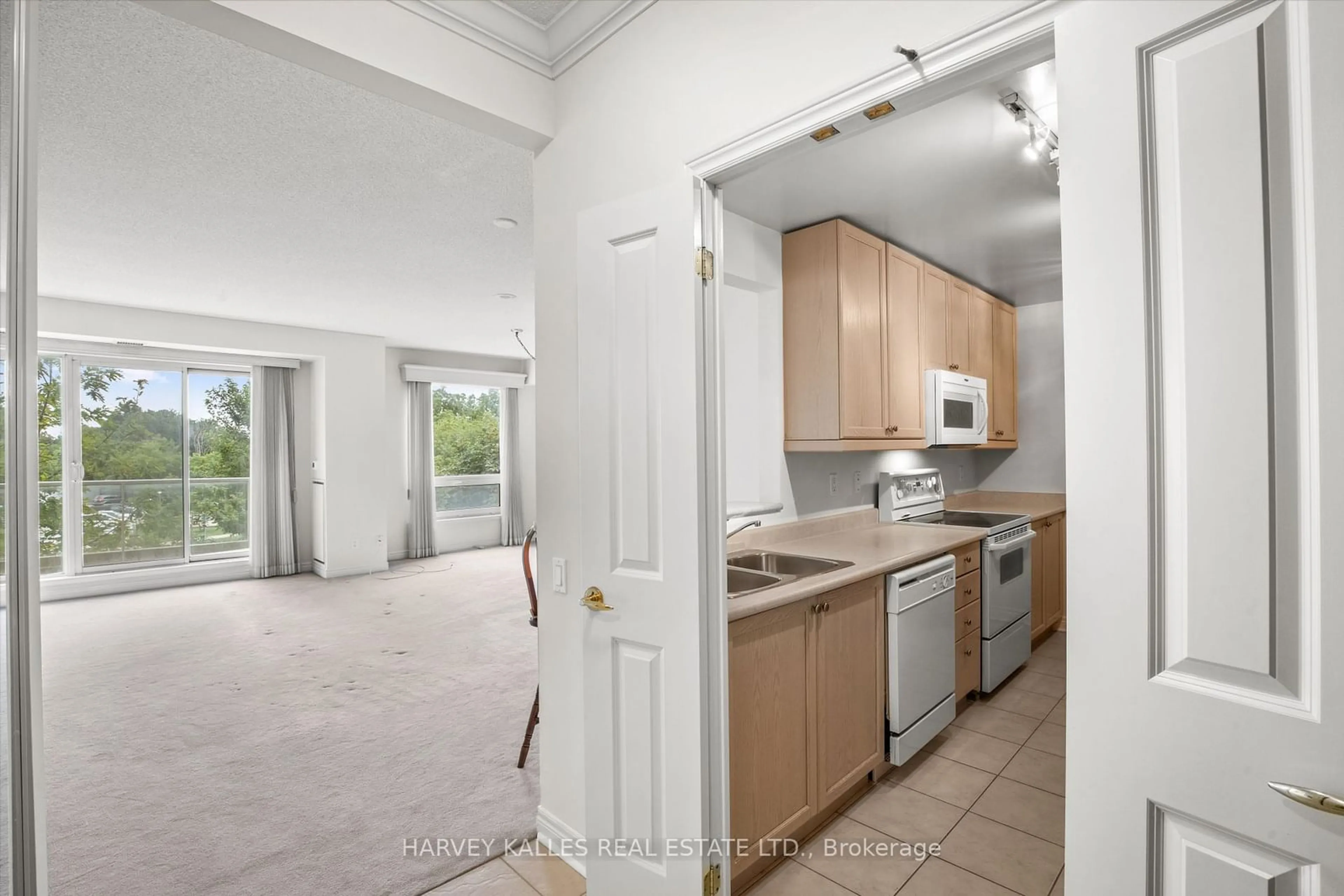 Standard kitchen, not visible floor, the street view for 350 Mill Rd #309, Toronto Ontario M9C 5R7