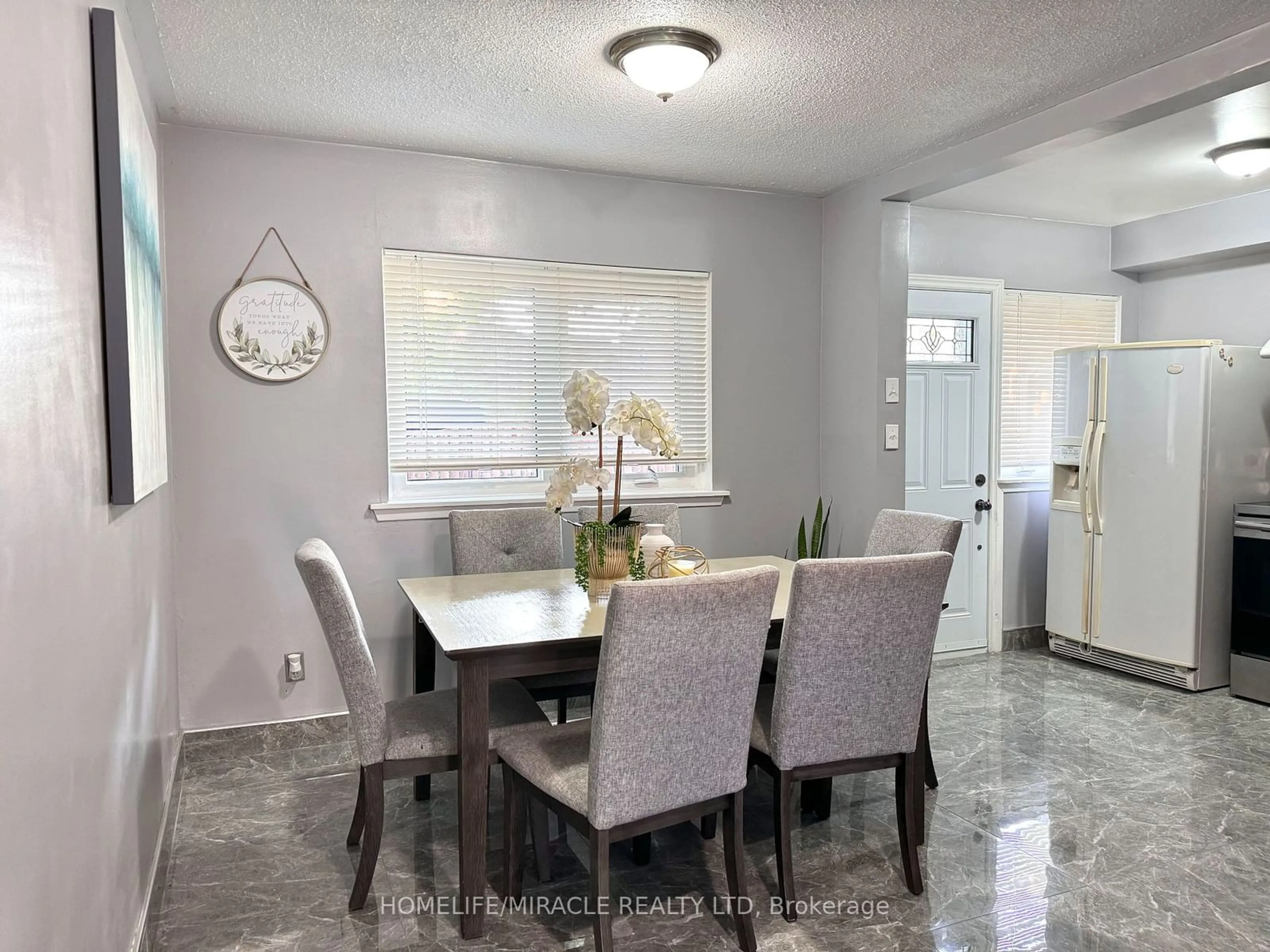 Dining room, ceramic floors for 6448 Finch Ave #188, Toronto Ontario M9V 1T4