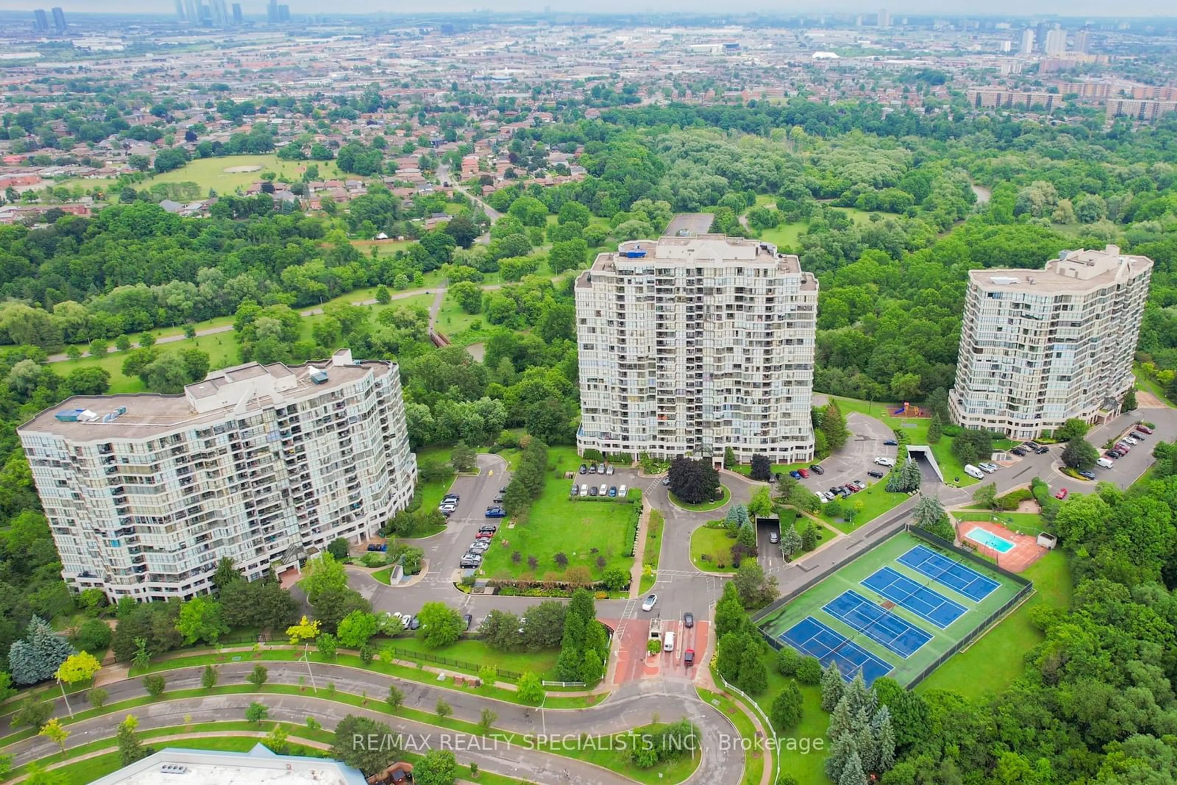 A pic from exterior of the house or condo, the view of city buildings for 5 Rowntree Rd #314, Toronto Ontario M9V 5G9