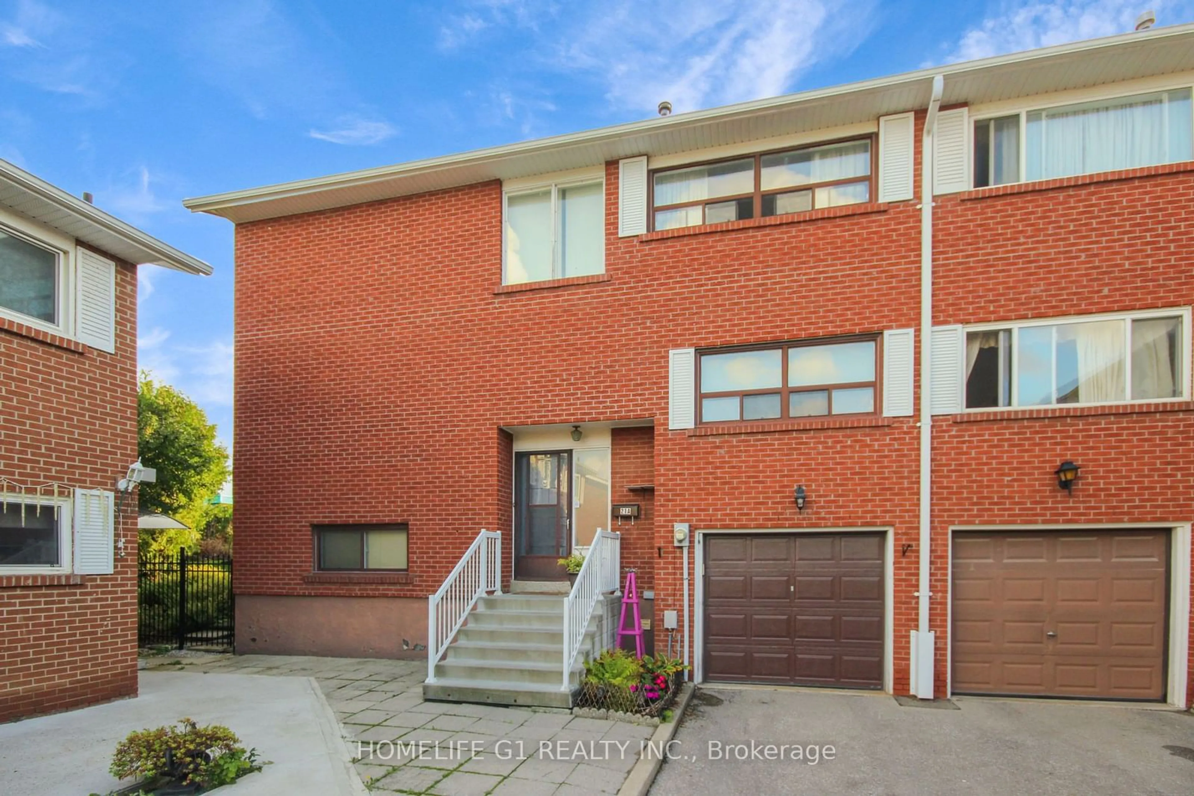 Home with brick exterior material for 21a Thistle Down Blvd #43, Toronto Ontario M9V 4A6