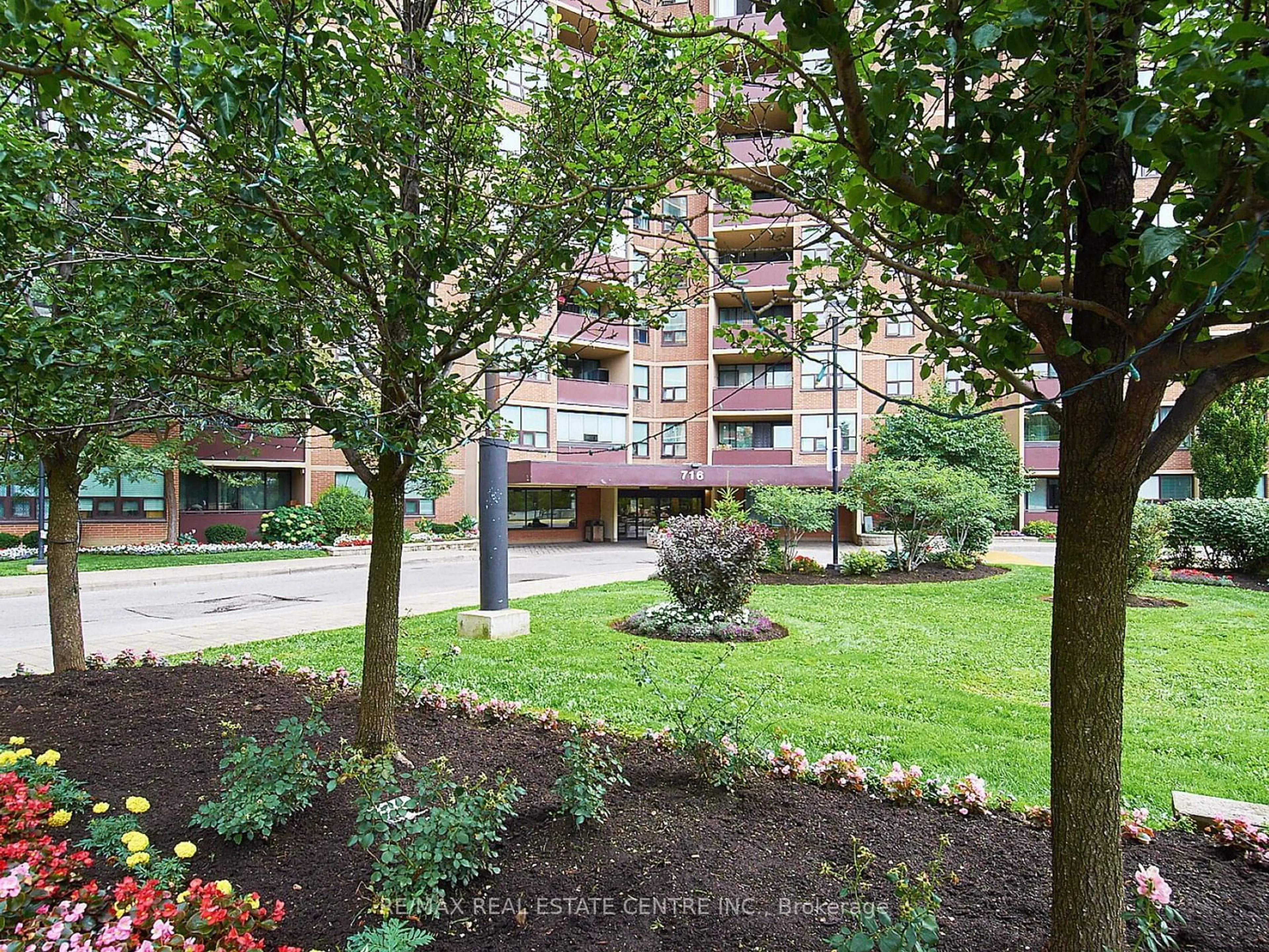 A pic from exterior of the house or condo, the street view for 716 The West Mall #1111, Toronto Ontario M9C 4X6