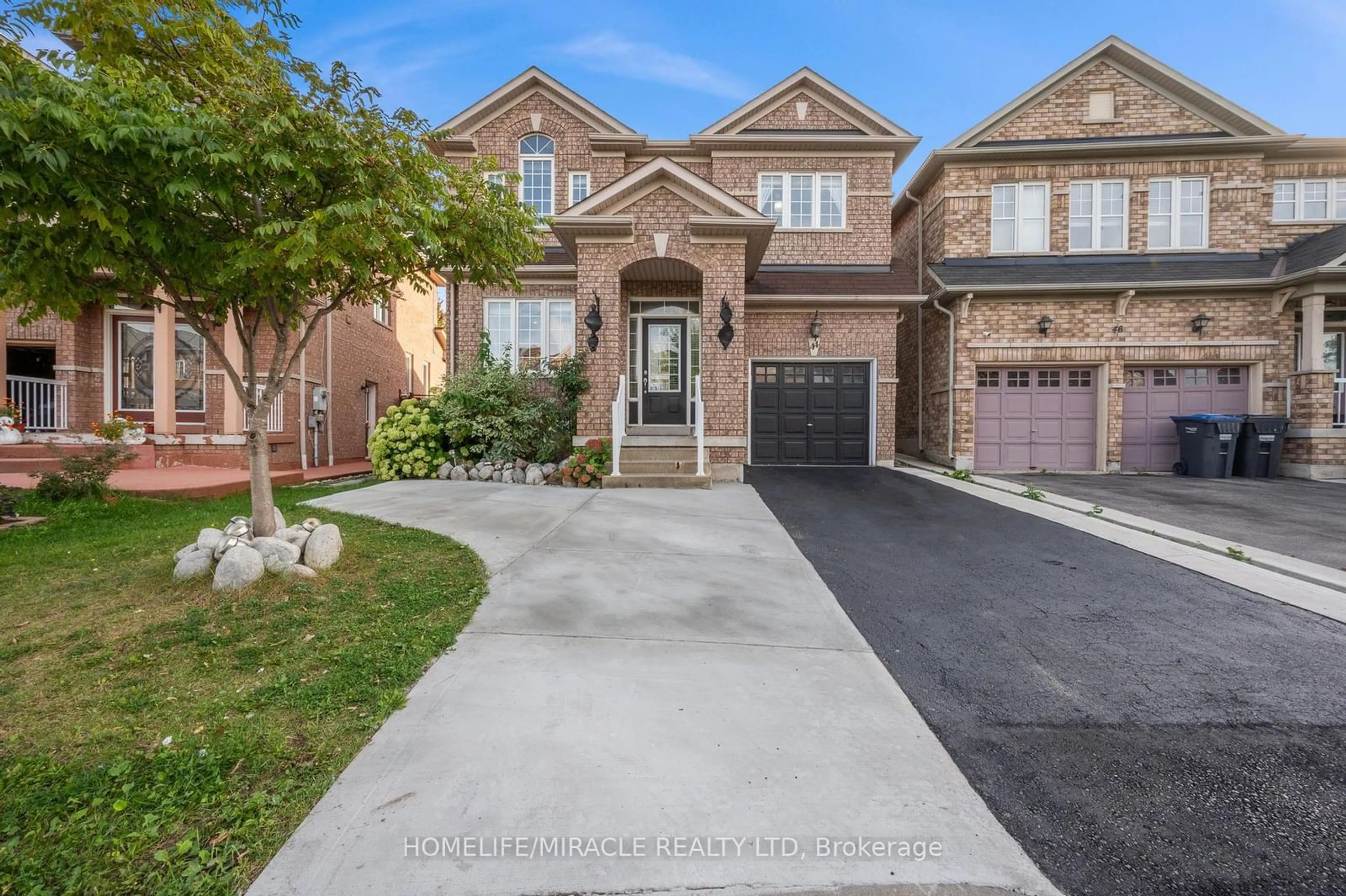 Frontside or backside of a home for 44 Wellsprings Dr, Brampton Ontario L6V 4T3