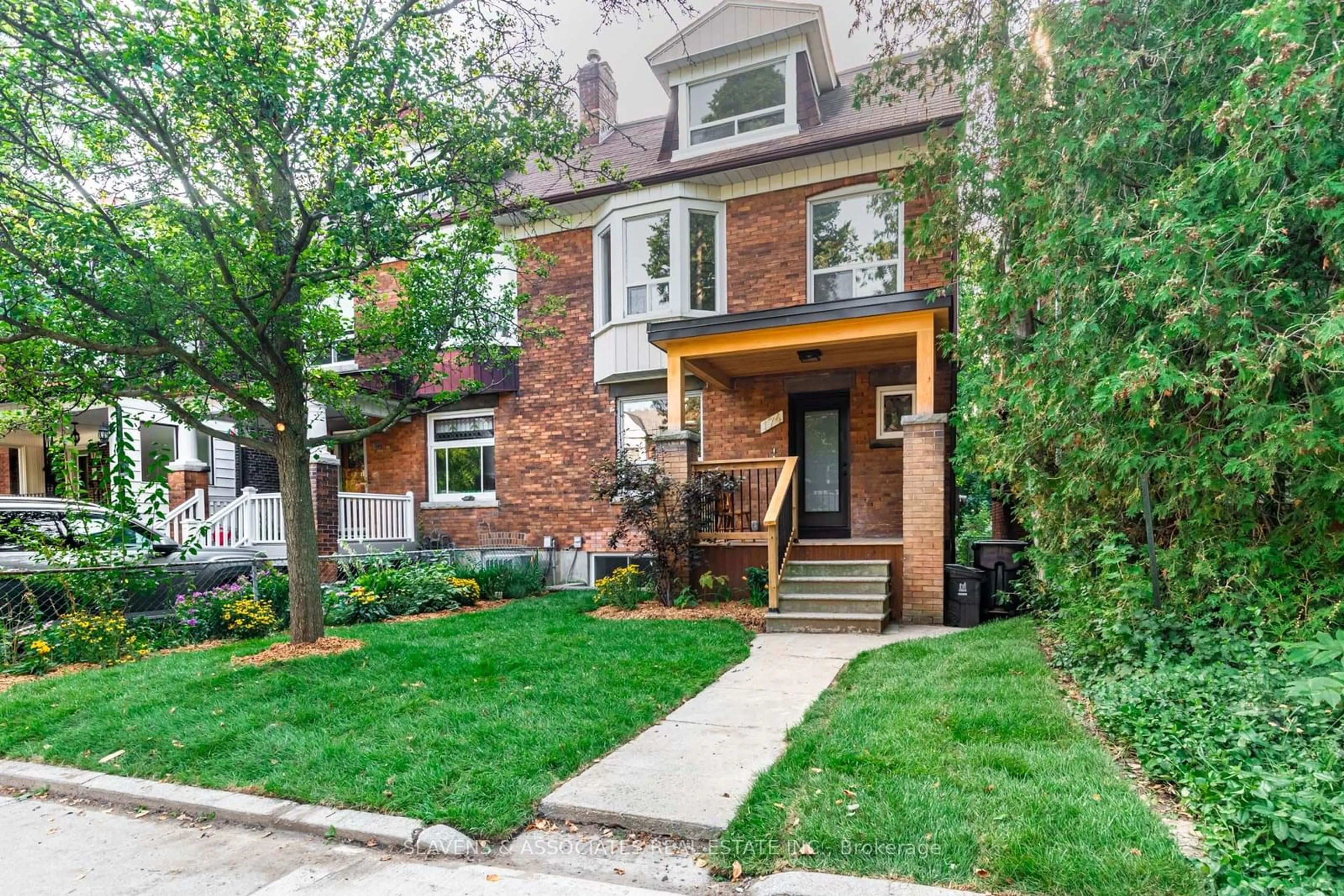 Home with brick exterior material for 174 Sunnyside Ave, Toronto Ontario M6R 2P6