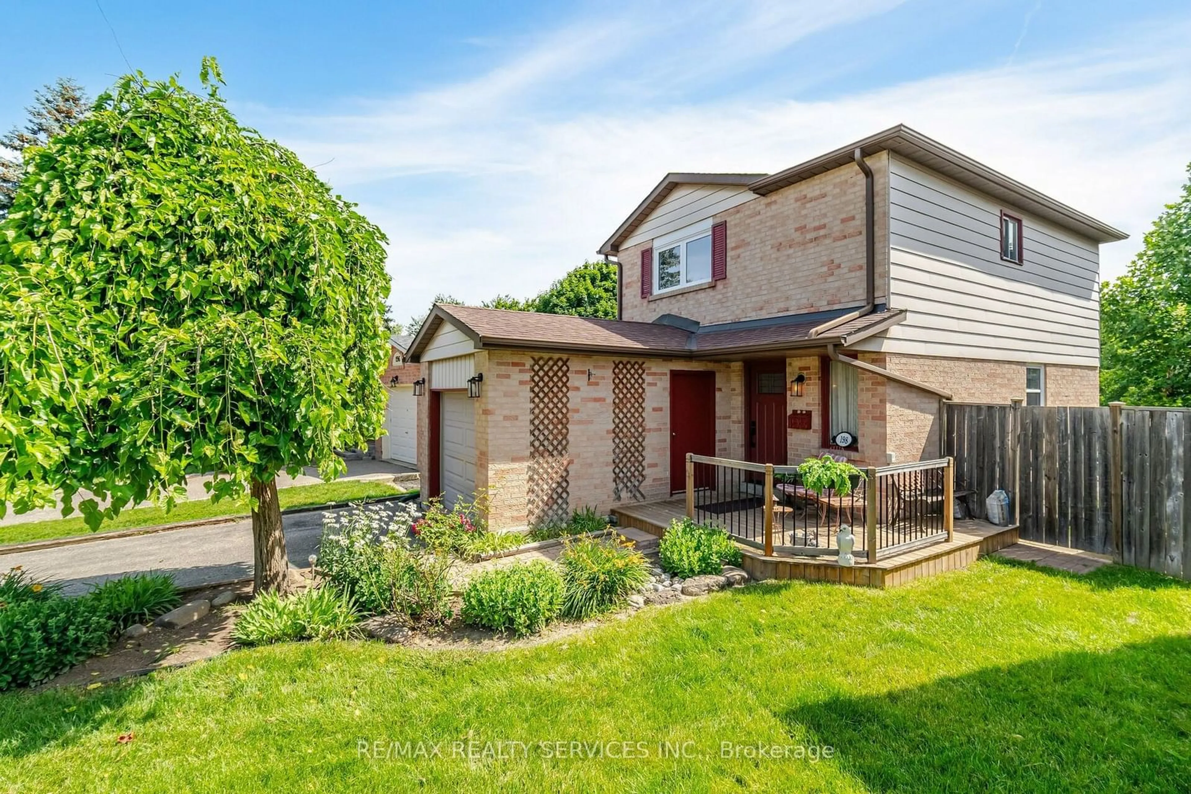 A pic from exterior of the house or condo, the fenced backyard for 198 Martindale Cres, Brampton Ontario L6X 2V2