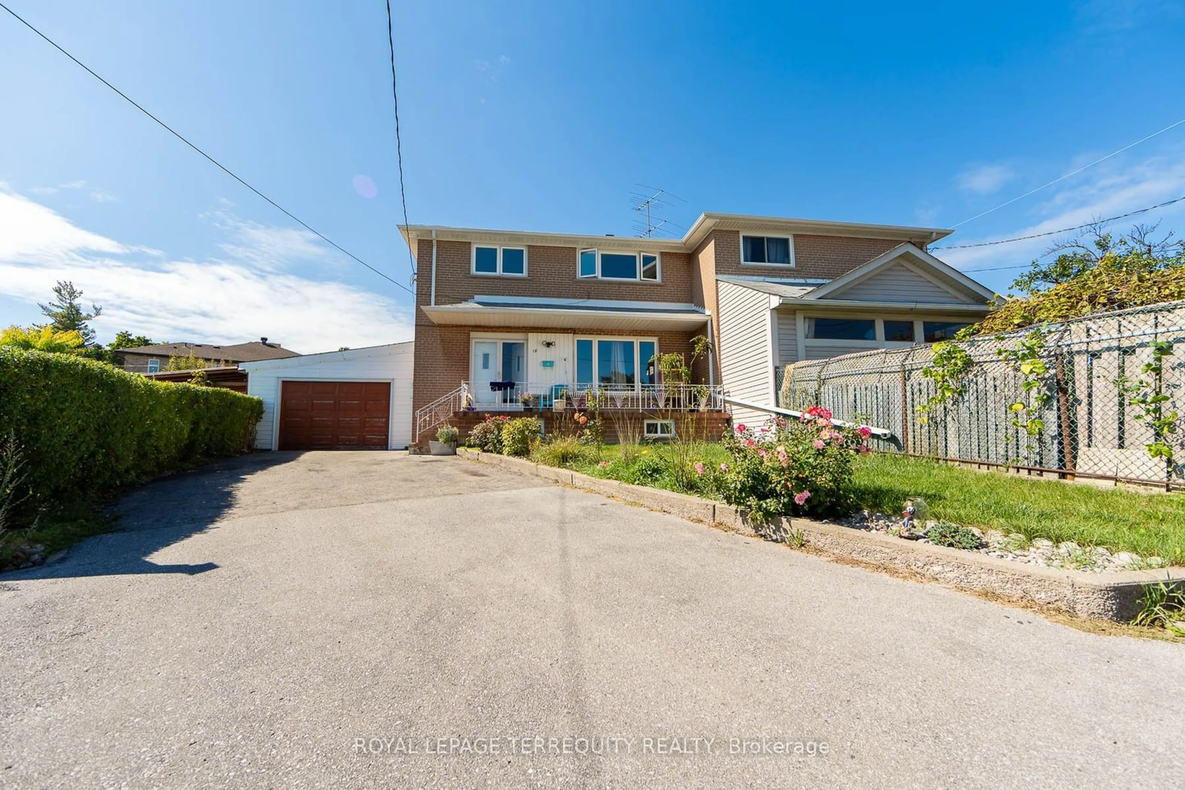 Frontside or backside of a home, the street view for 18 Rosette Crt, Toronto Ontario M9M 1Z7