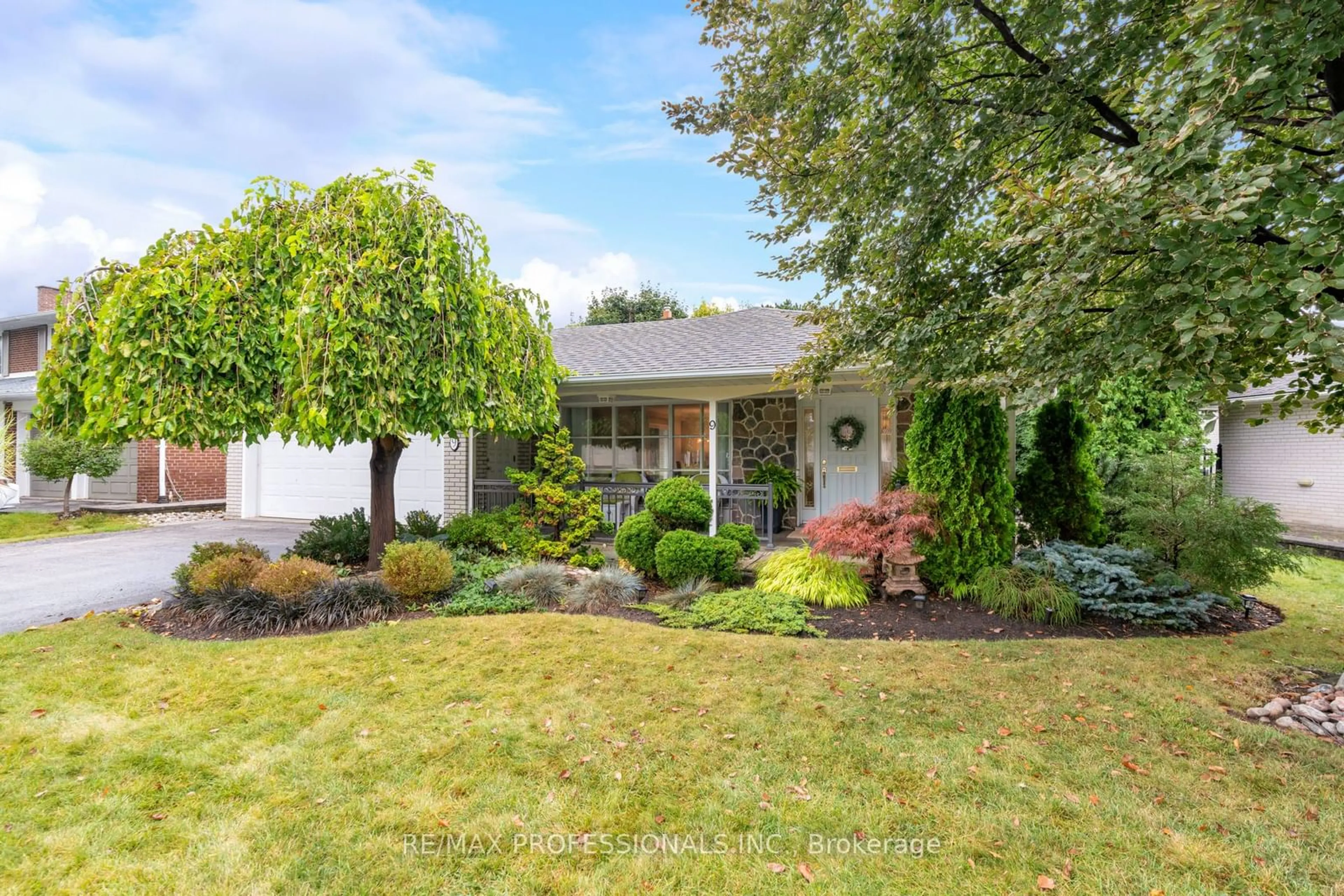 Frontside or backside of a home, the fenced backyard for 9 Conifer Dr, Toronto Ontario M9C 1X3