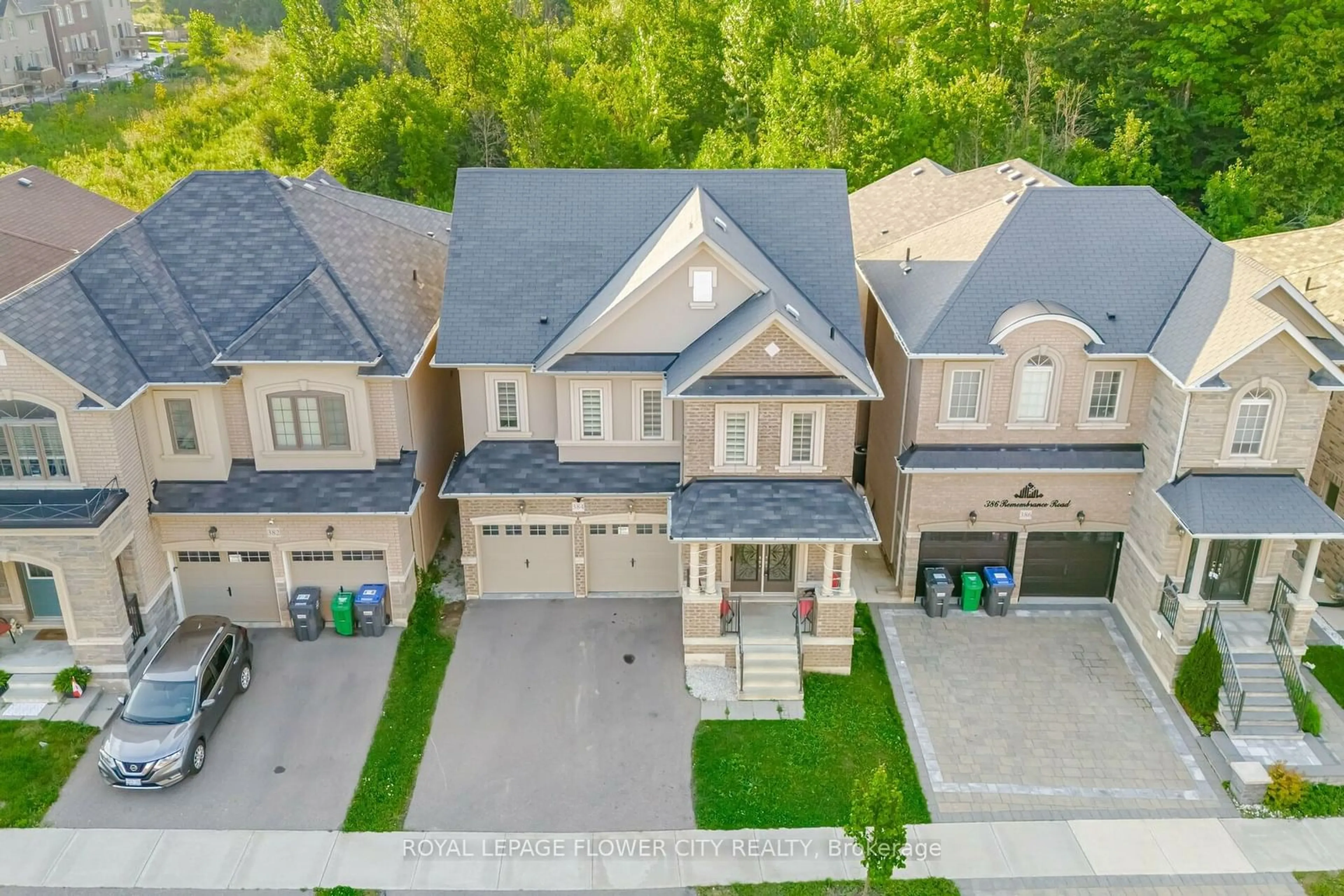 Frontside or backside of a home, the street view for 384 Remembrance Rd, Brampton Ontario L7A 4X9