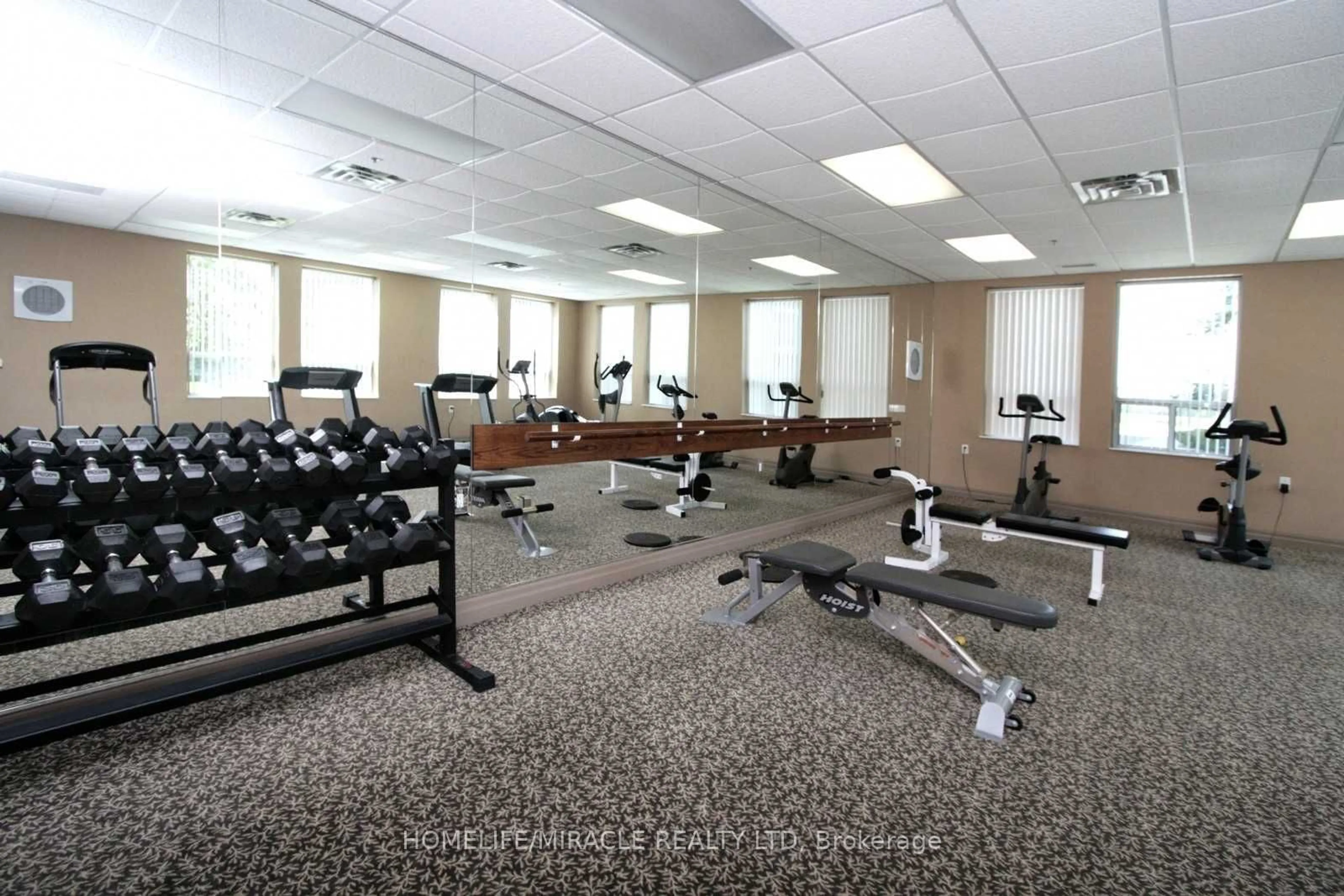 Gym or fitness room, carpet floors for 4889 KIMBERMOUNT Ave #203, Mississauga Ontario L5M 7R9