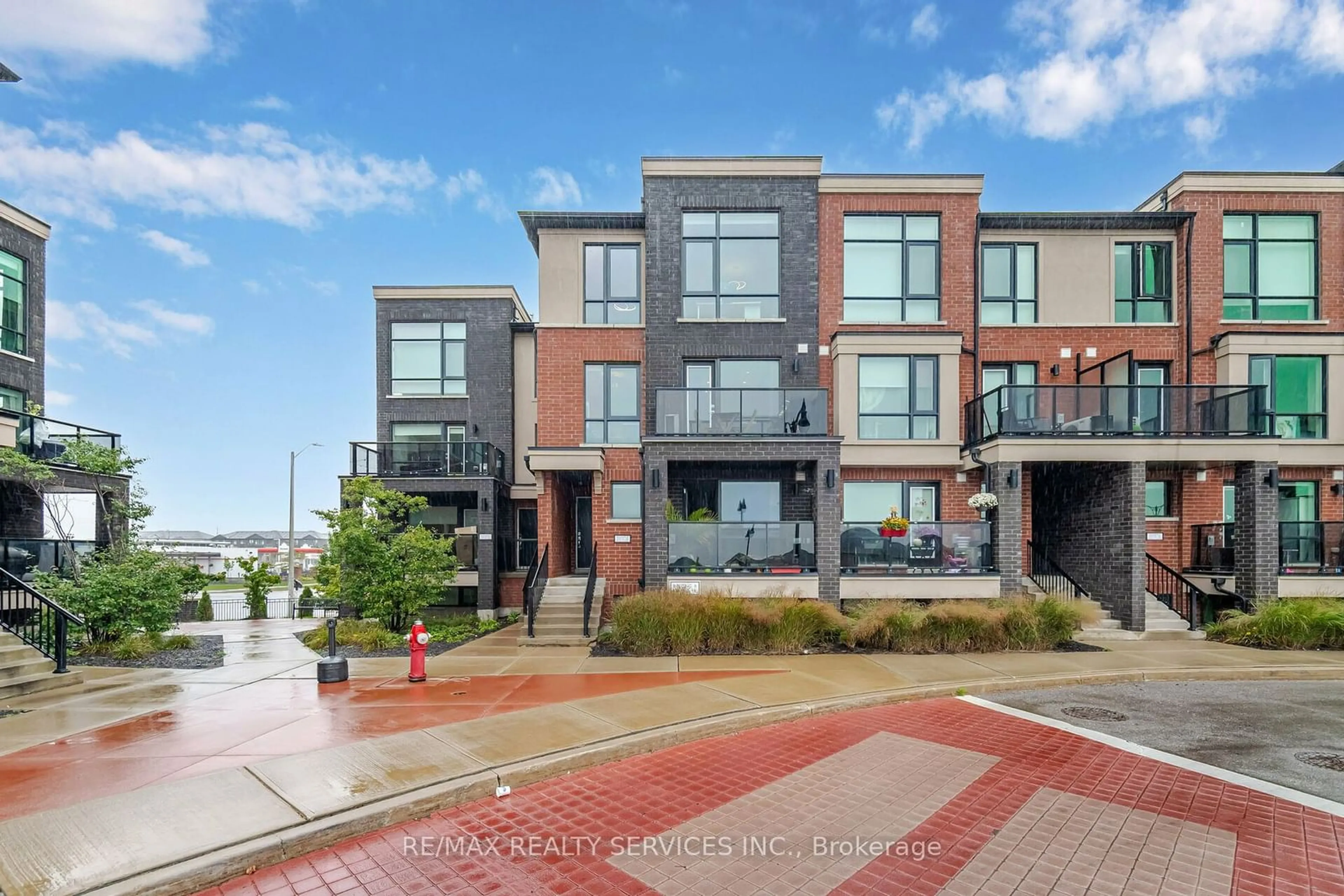 A pic from exterior of the house or condo, the street view for 100 Dufay Rd #27, Brampton Ontario L7A 4S3