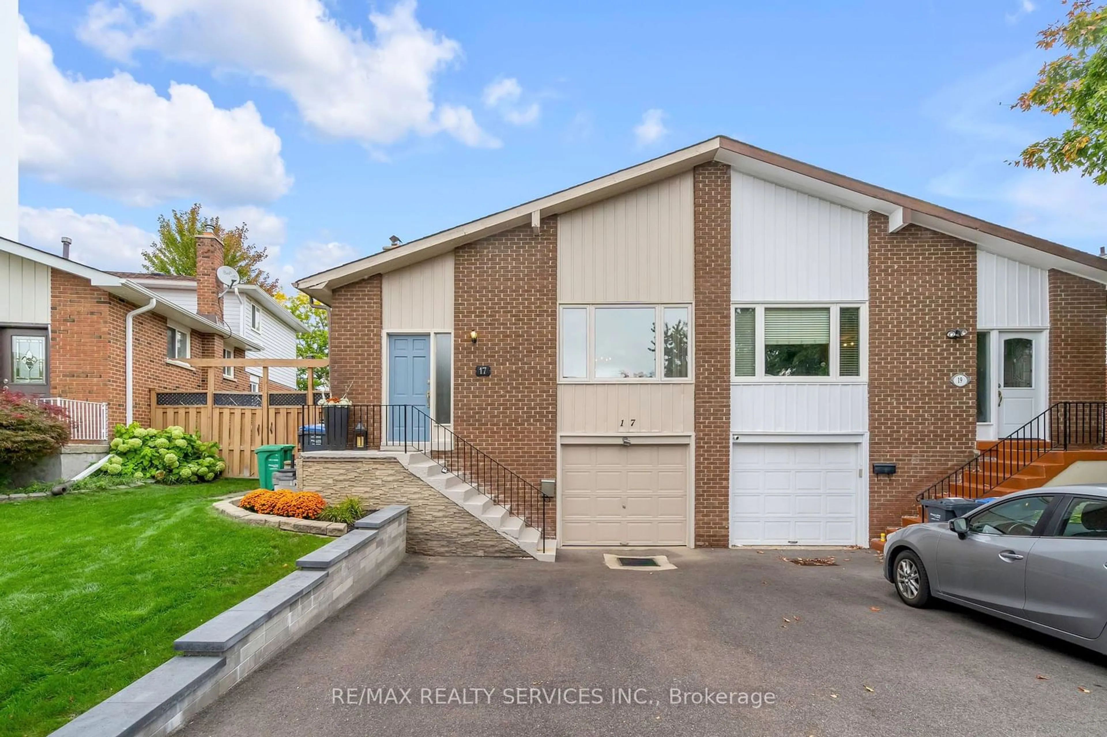 Frontside or backside of a home, the fenced backyard for 17 Newlyn Cres, Brampton Ontario L6V 3A9