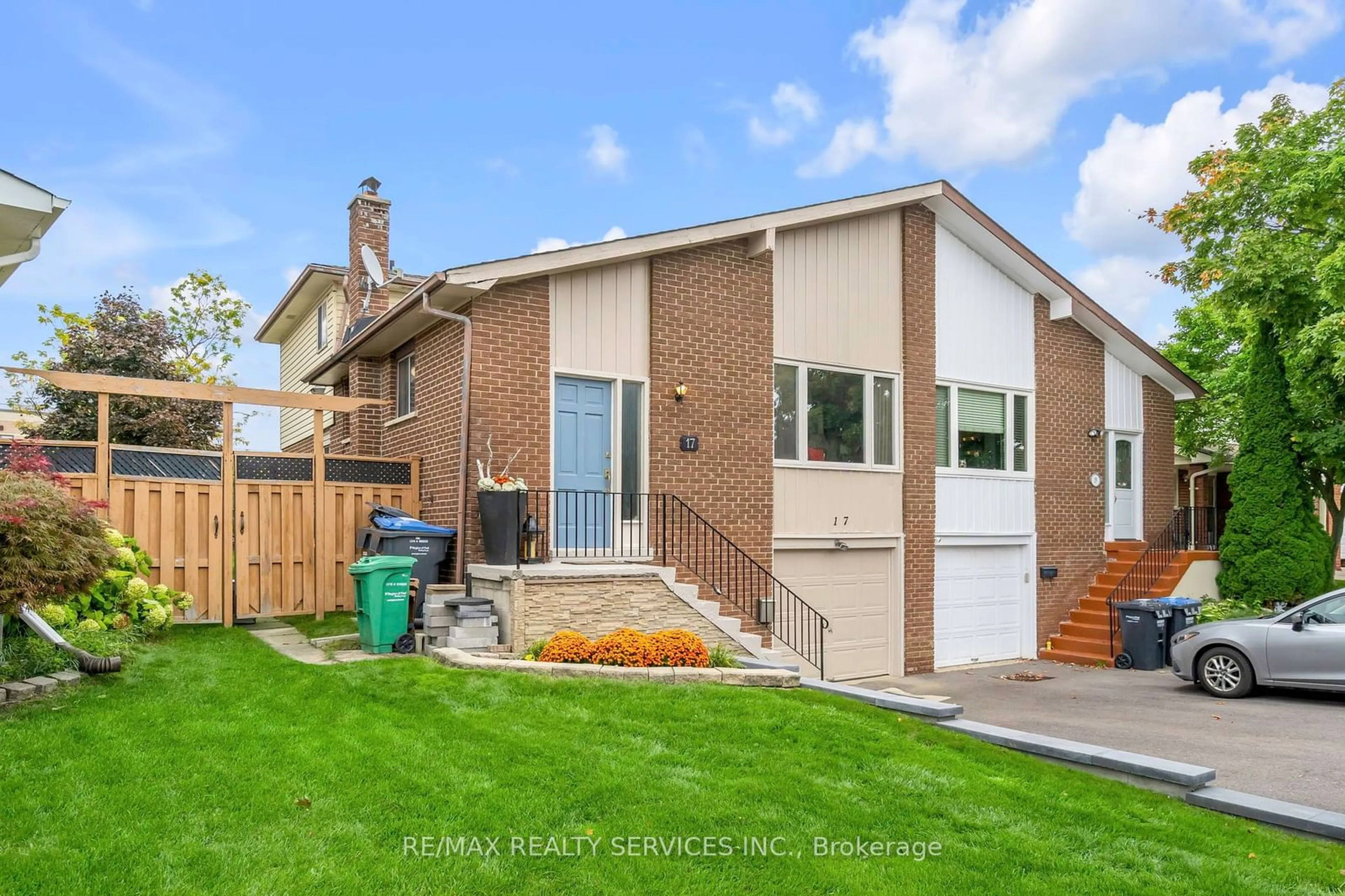 Frontside or backside of a home, the fenced backyard for 17 Newlyn Cres, Brampton Ontario L6V 3A9