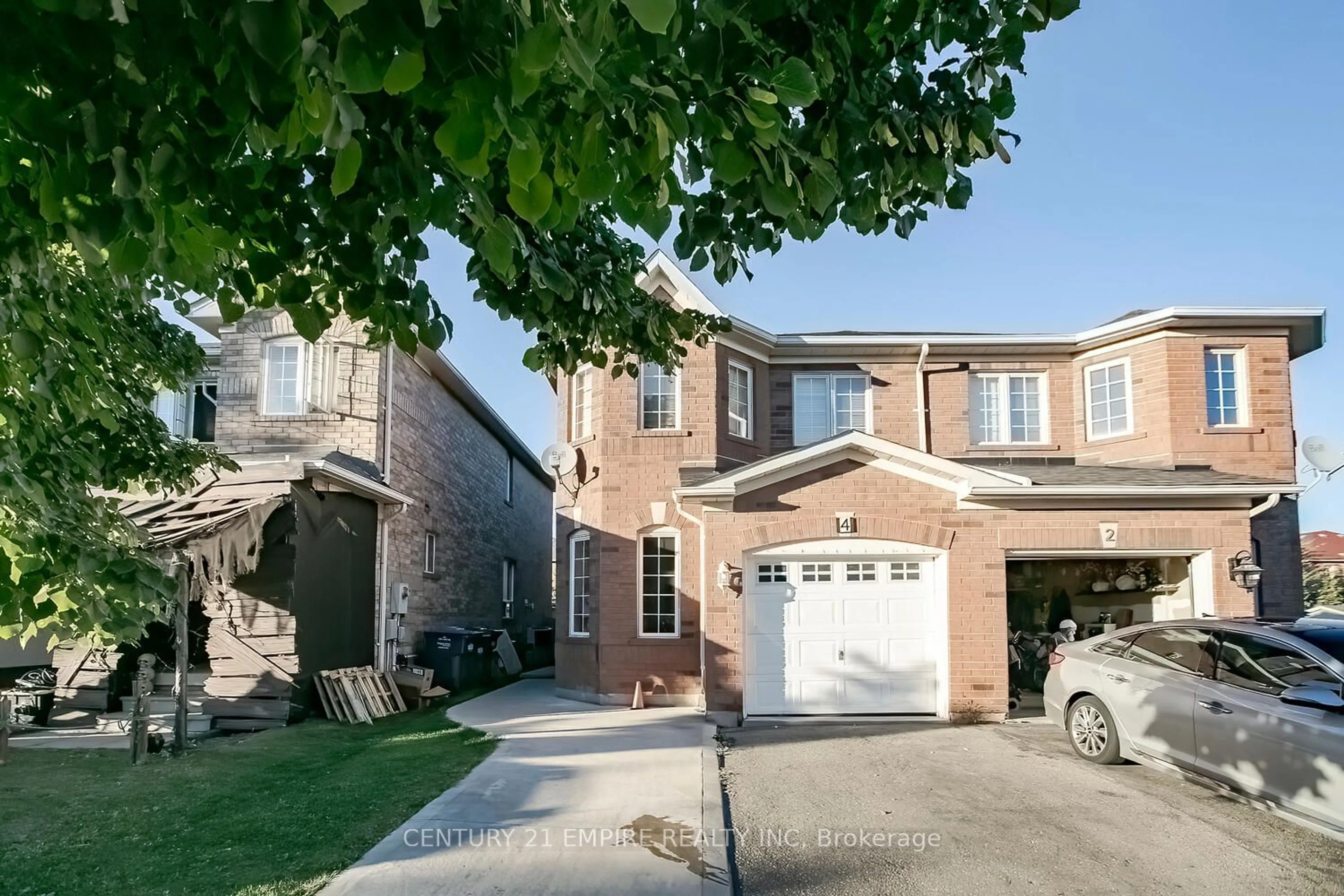 Home with brick exterior material for 4 Lake Louise Dr, Brampton Ontario L6X 4W7