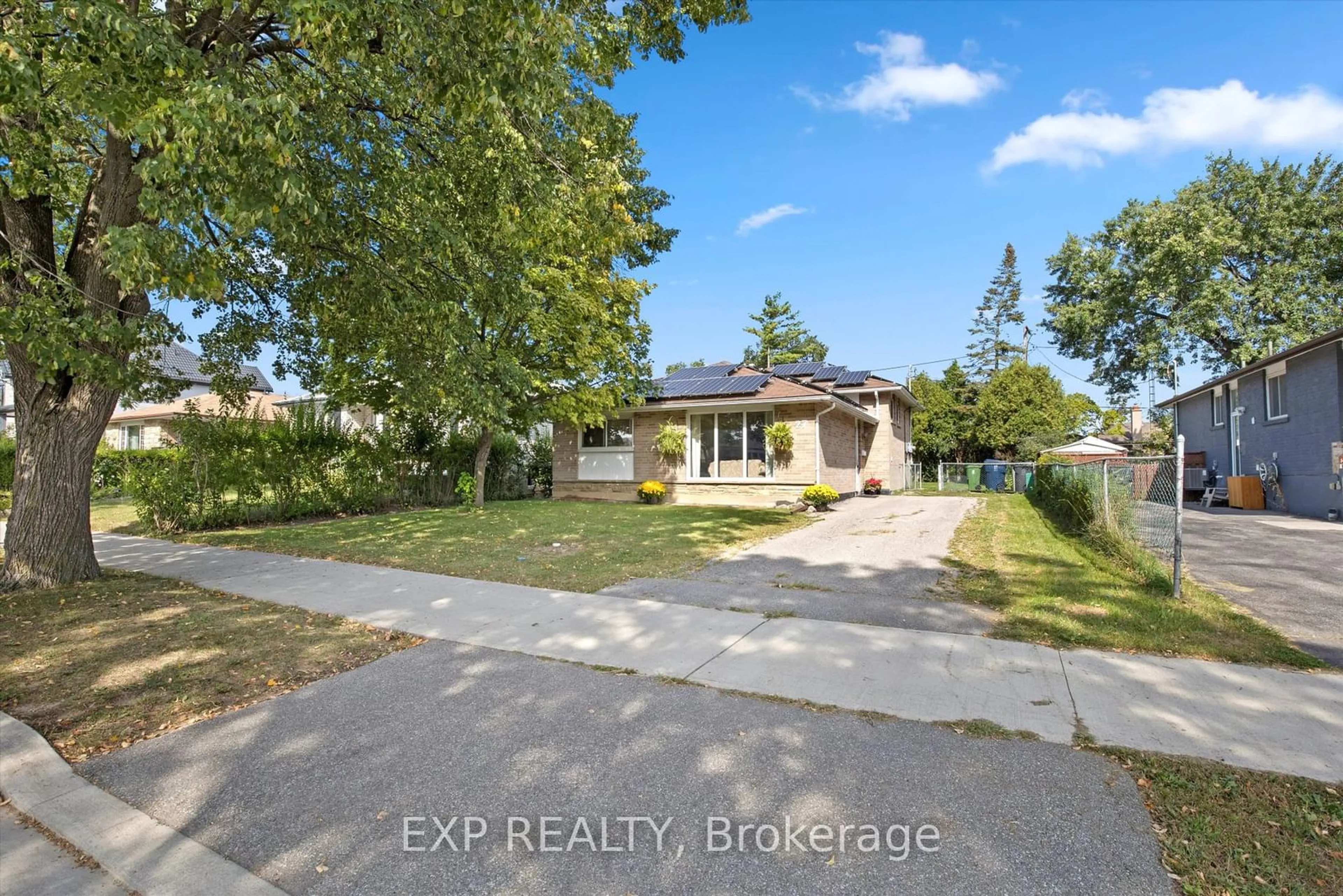 Frontside or backside of a home, the street view for 27 Blackbush Dr, Toronto Ontario M9V 3N8