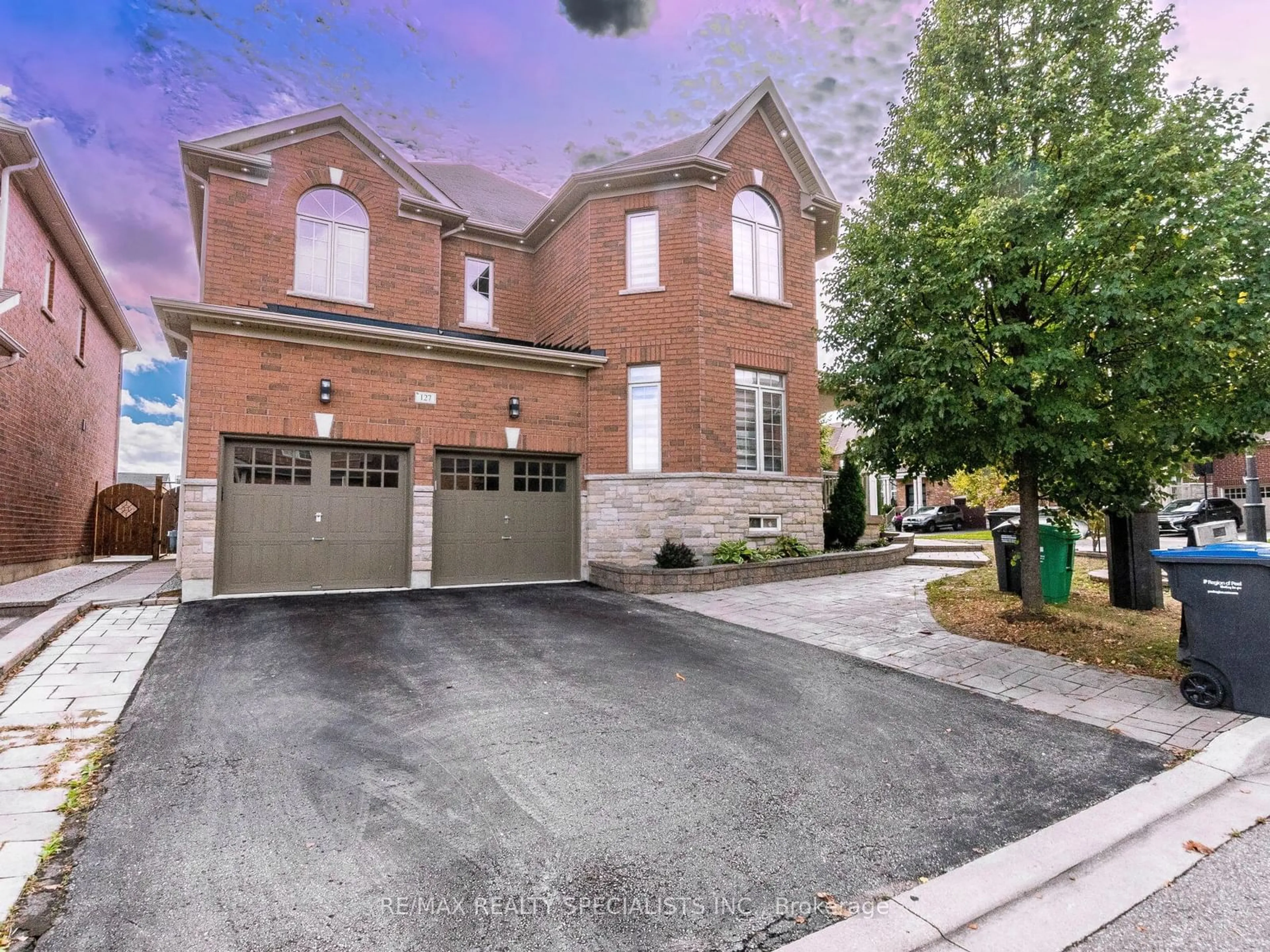 Home with brick exterior material for 127 Lloyd Sanderson Dr, Brampton Ontario L6Y 0Z9