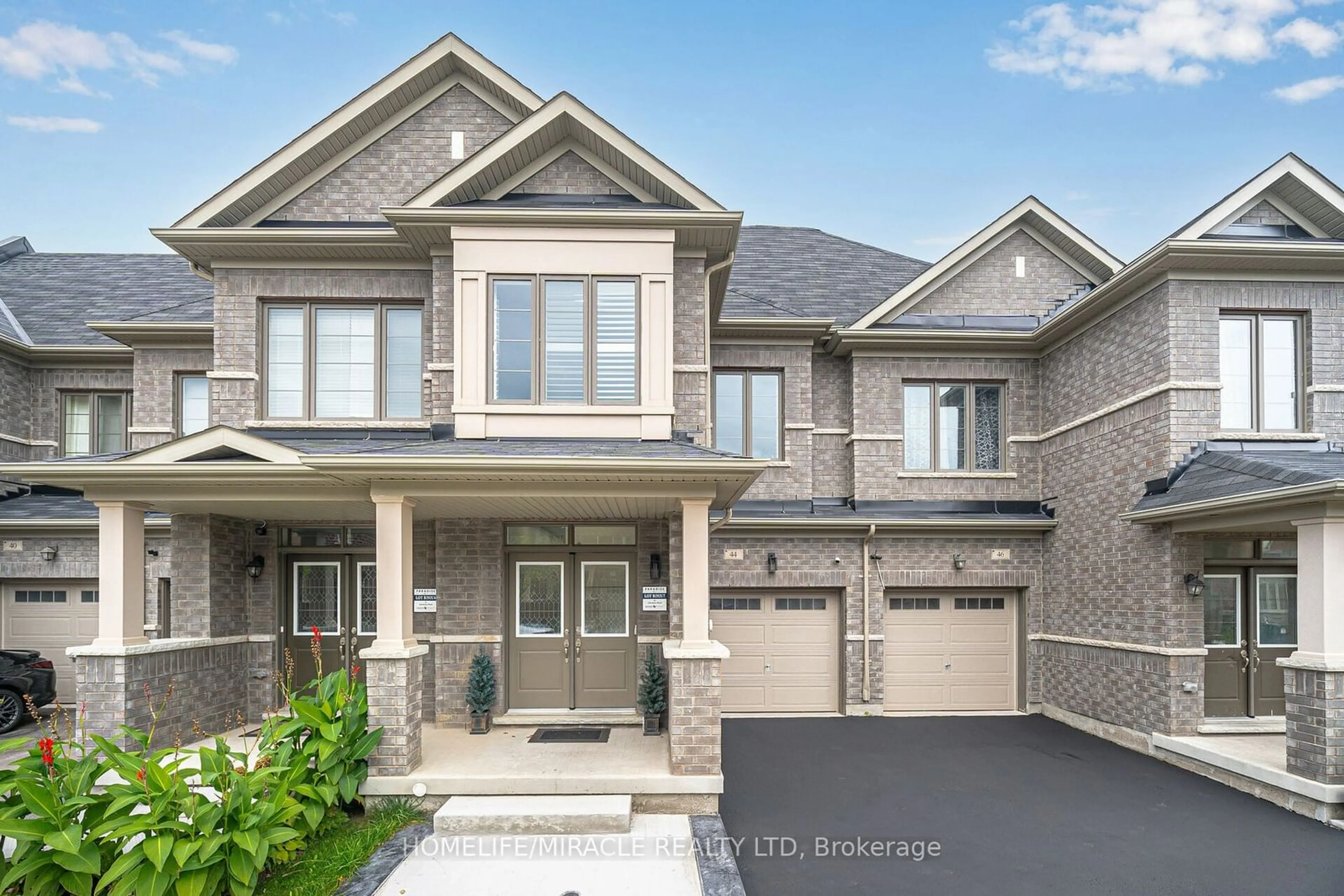 Home with brick exterior material for 44 Adventura Rd, Brampton Ontario L7A 5A7