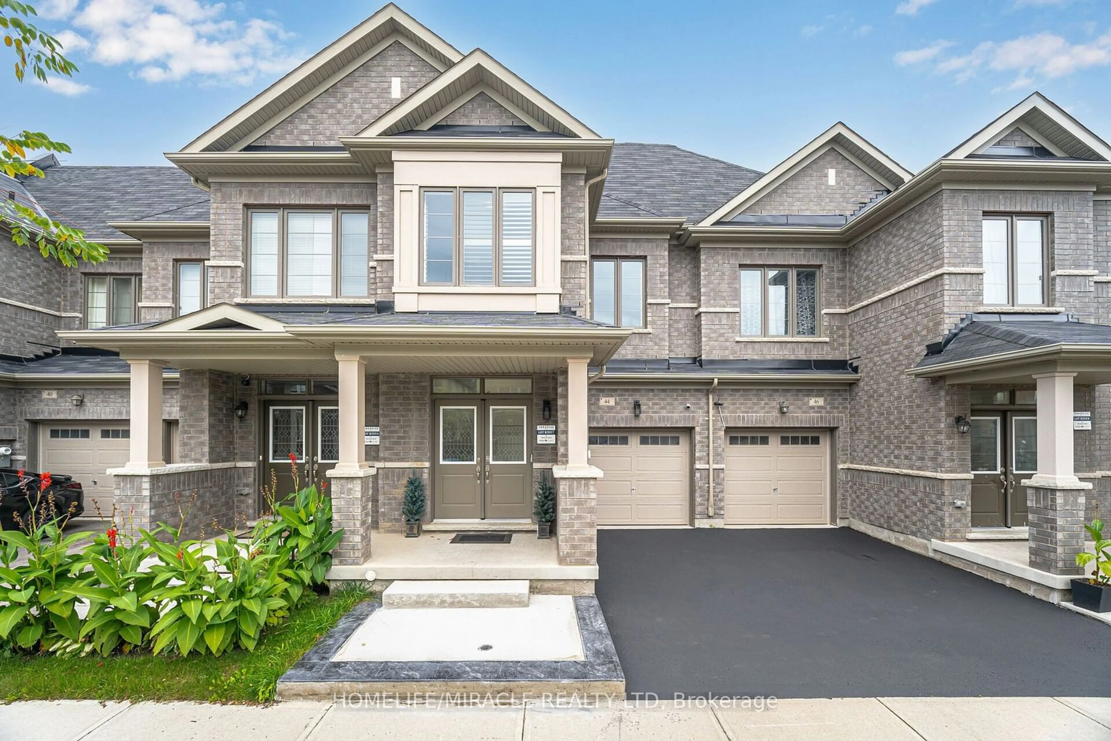 Home with brick exterior material for 44 Adventura Rd, Brampton Ontario L7A 5A7