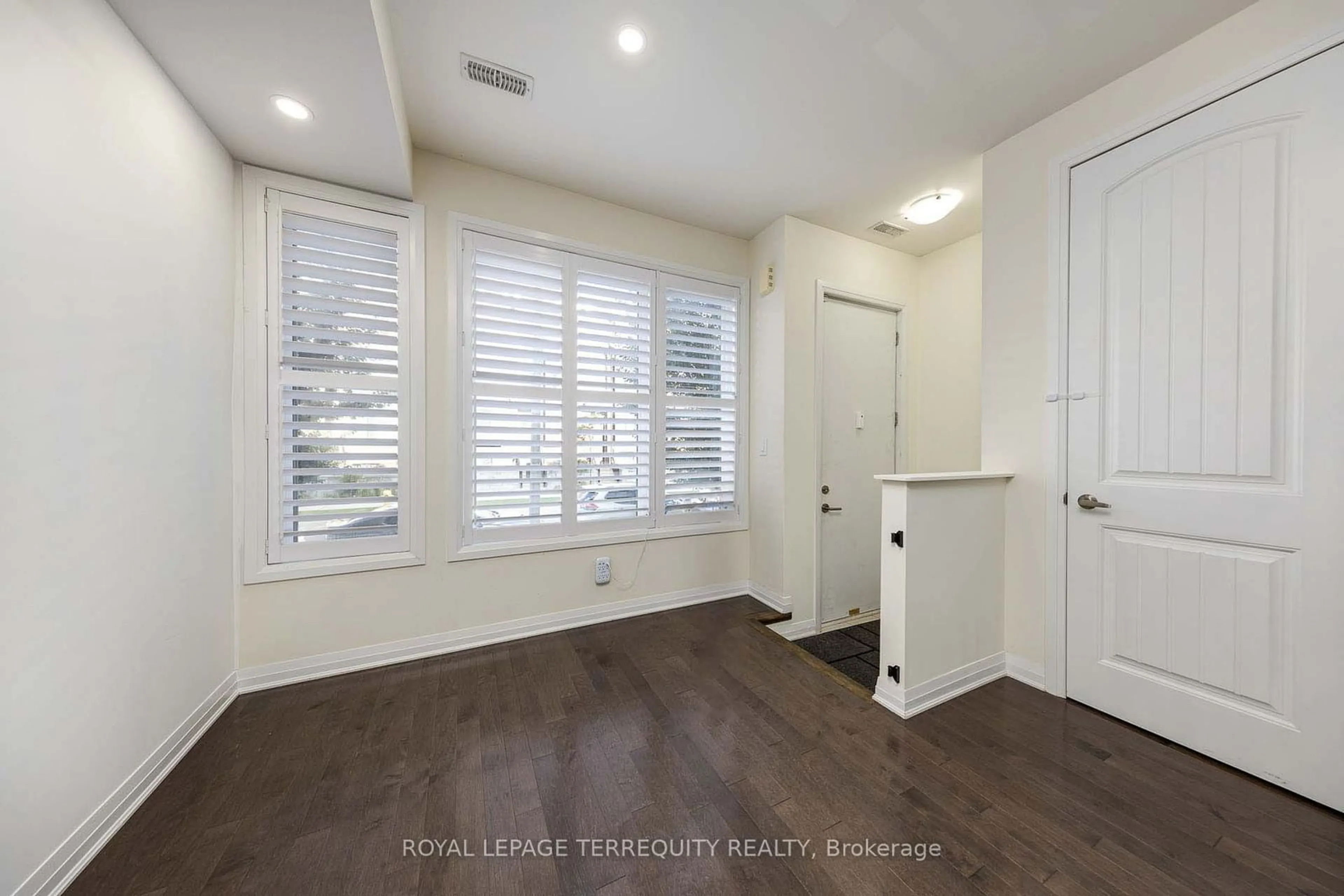 A pic of a room, wood floors for 22 Caroline Carpenter Grve, Toronto Ontario M3K 0B1